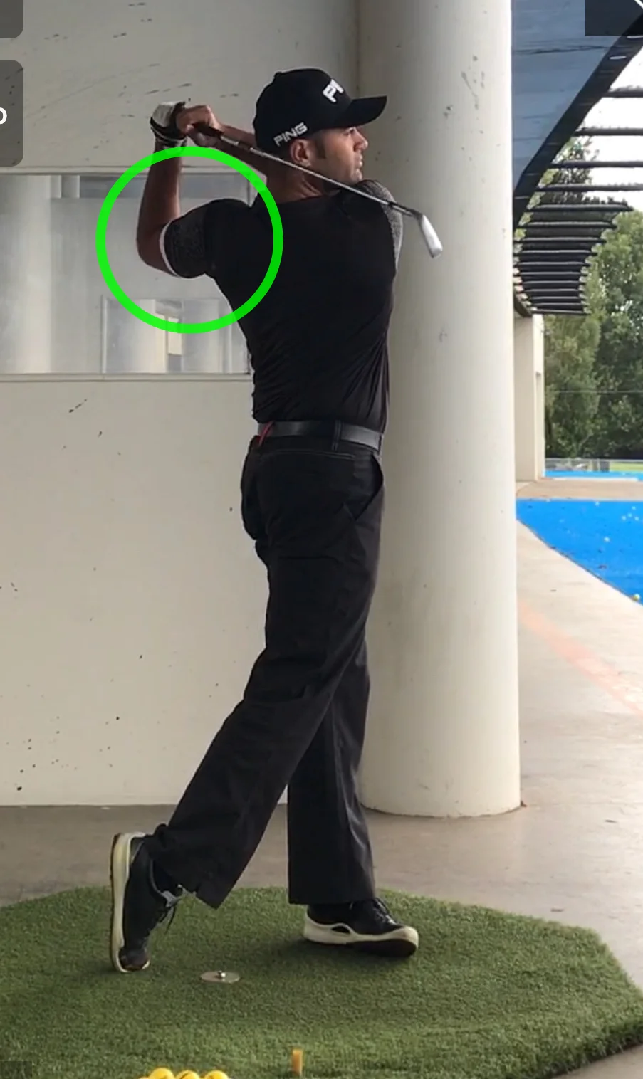 Left elbow pointing down after the follow through