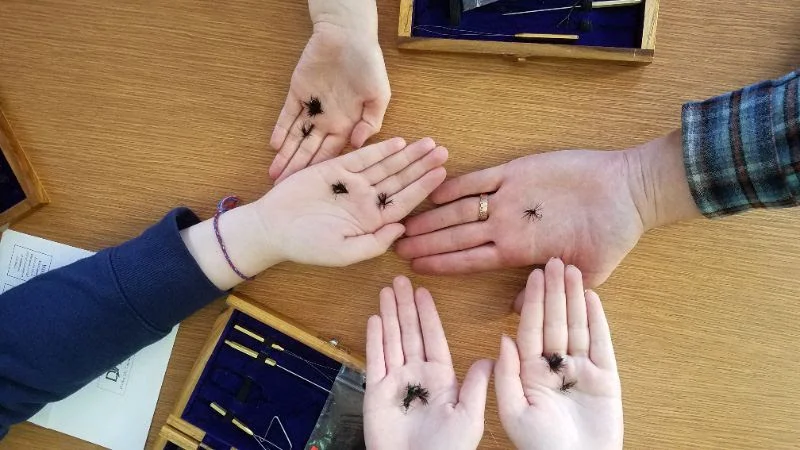 Cherryfield Elementary students tying flies with Joe