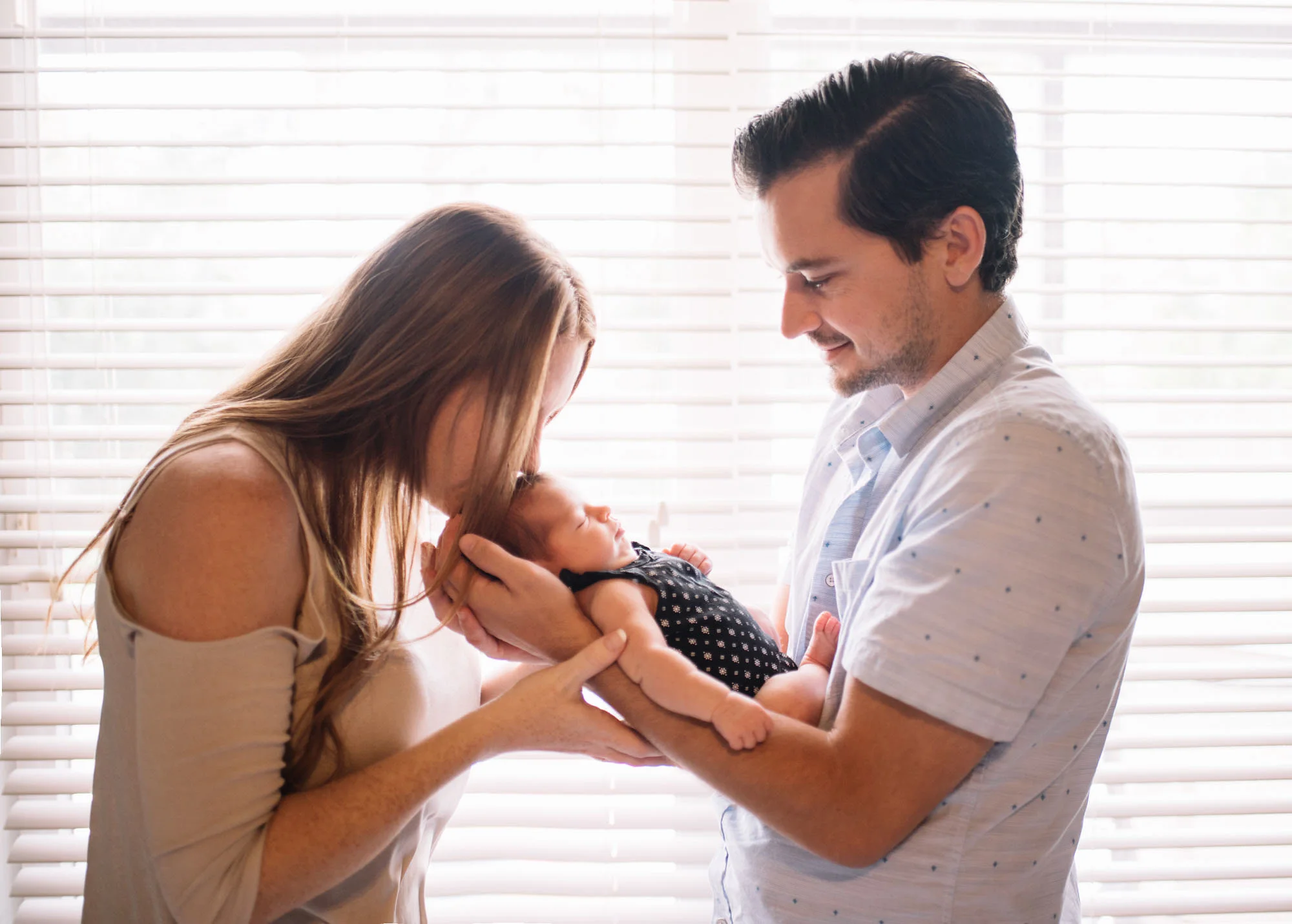 mom and dad newborn photo