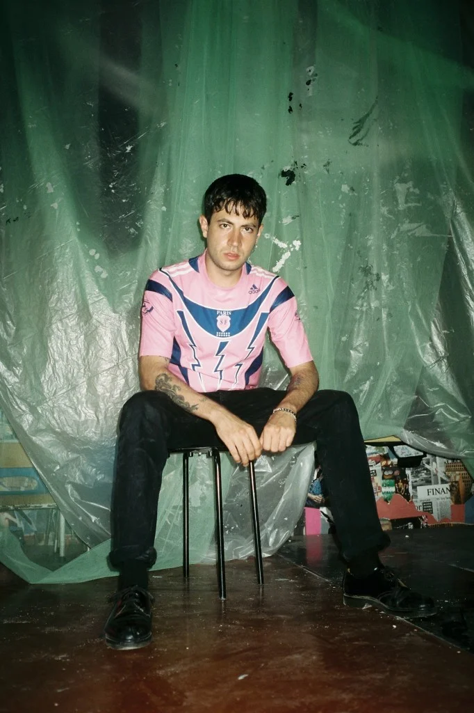  Elliot Berthault (Synth and Vocals, Rendez-Vous) wears ADIDAS shirt, AG jeans, and DR. MARTENS shoes. 