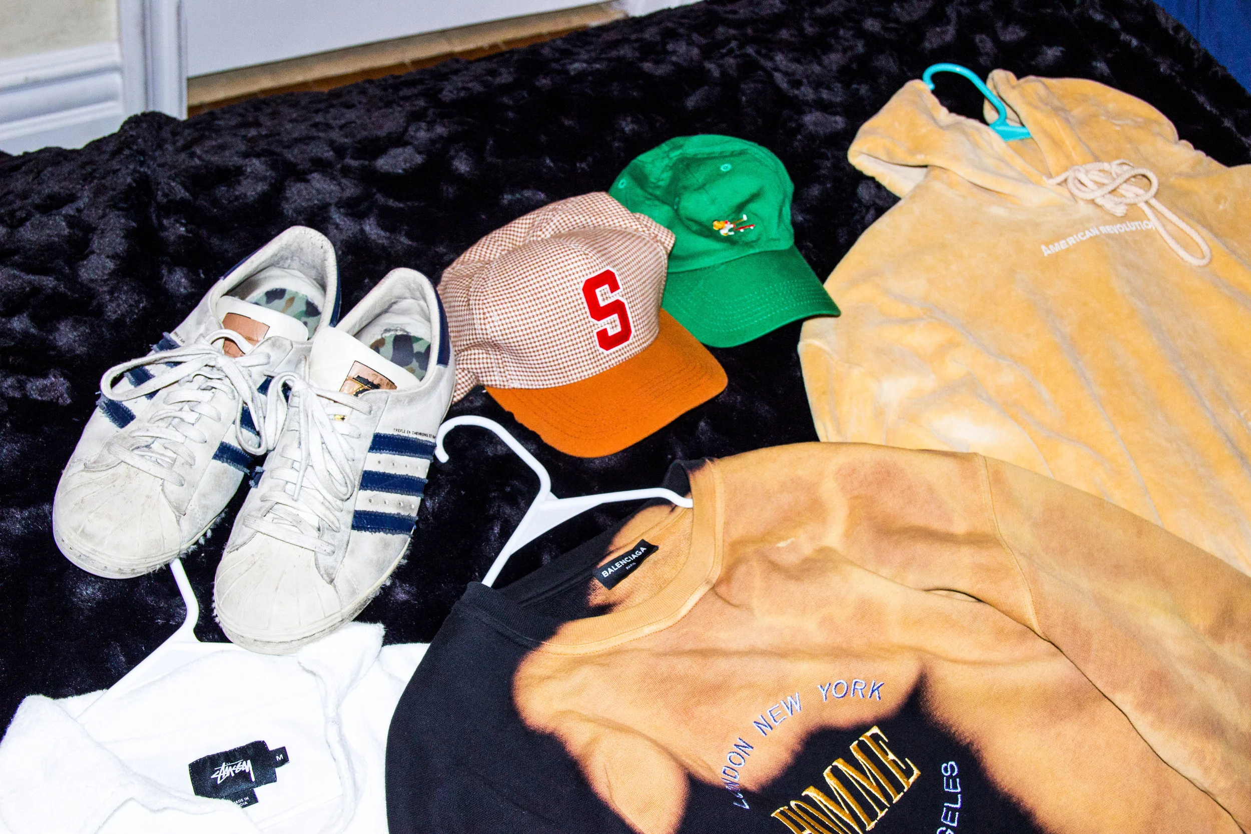 Zion describes himself as the "hat man" and shows that his favorite pieces were chosen to reflect how he dresses for comfort.