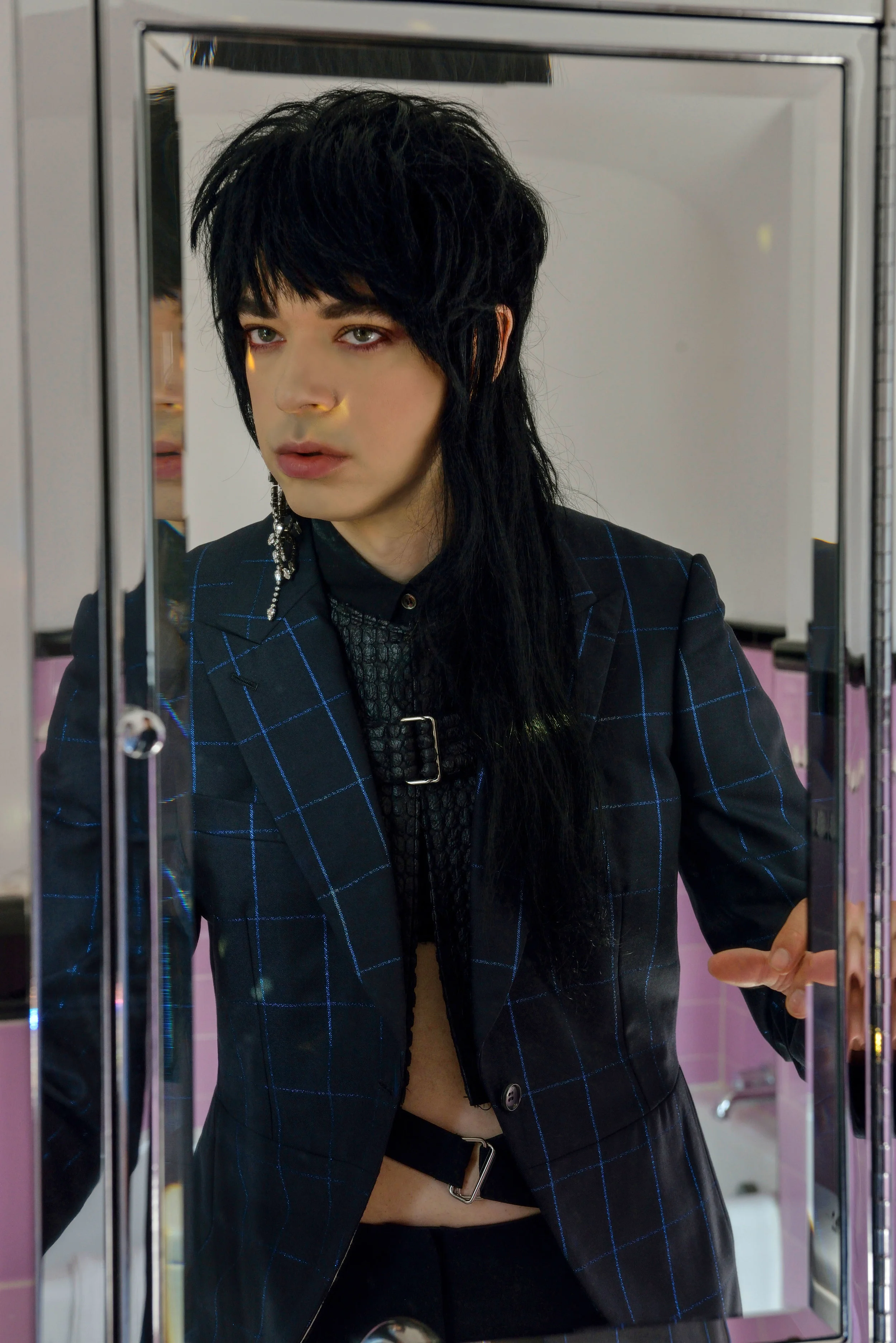 COMME DES GARÇONS suit, PIERS ATKINSON veil, and STEFERE ring.