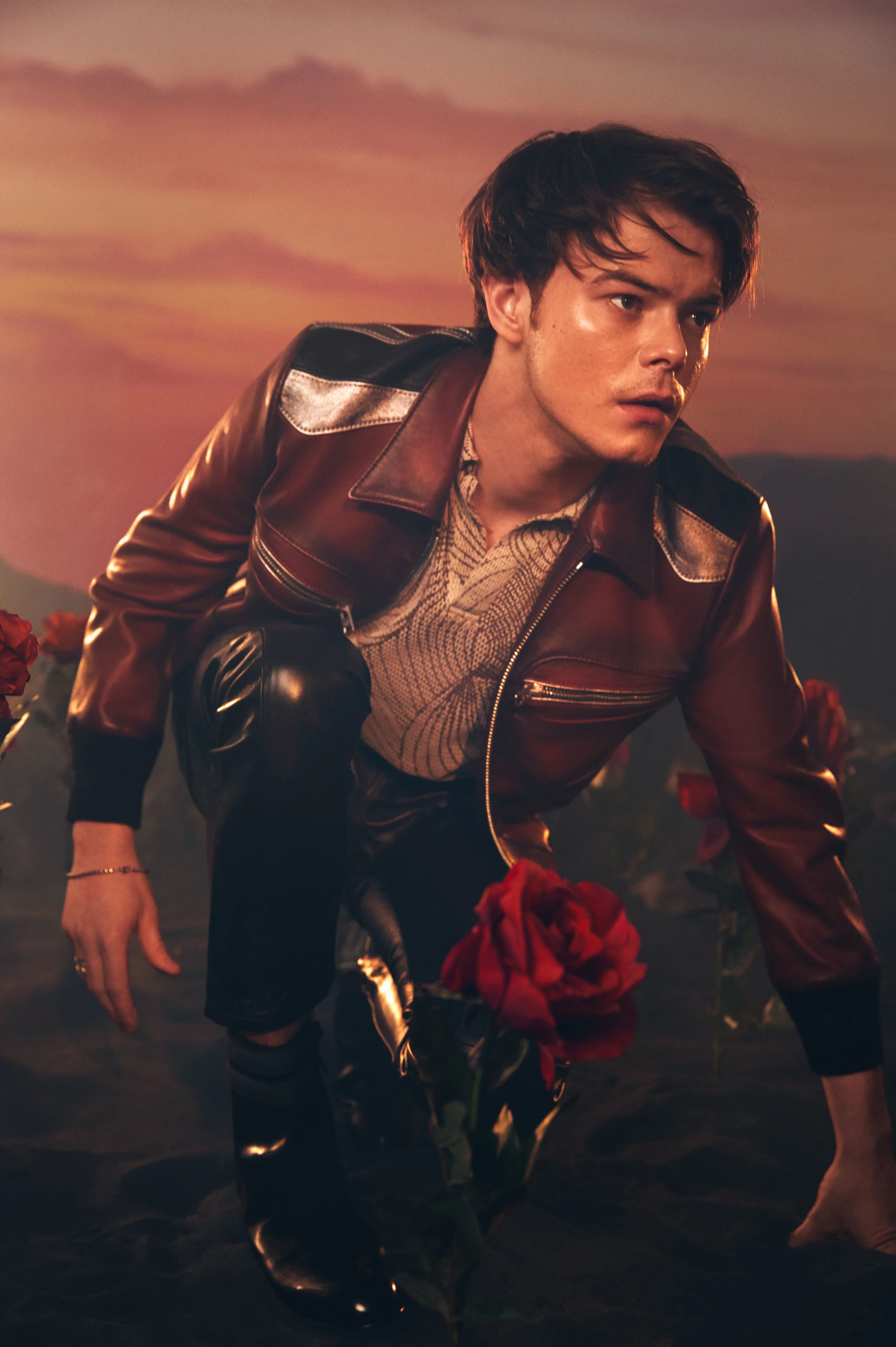 COACH 1941 jacket and pants, DRIES VAN NOTEN shirt, JIMMY CHOO boots, ARIS SCHWABE ring available at Matchesfashion. com, and stylist’s own bracelet.