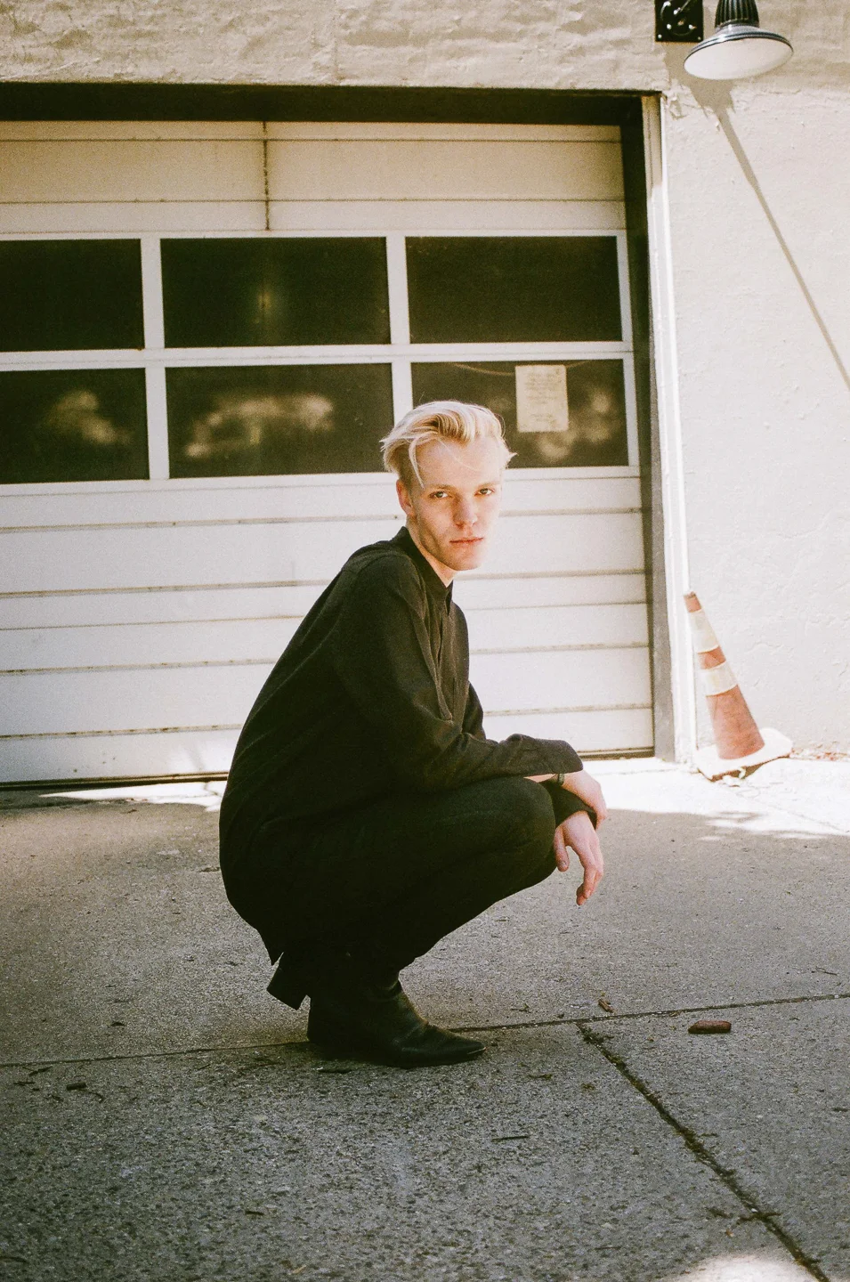 OUR LEGACY shirt, CITIZENS OF HUMANITY jeans and ACNE STUDIOS boots.