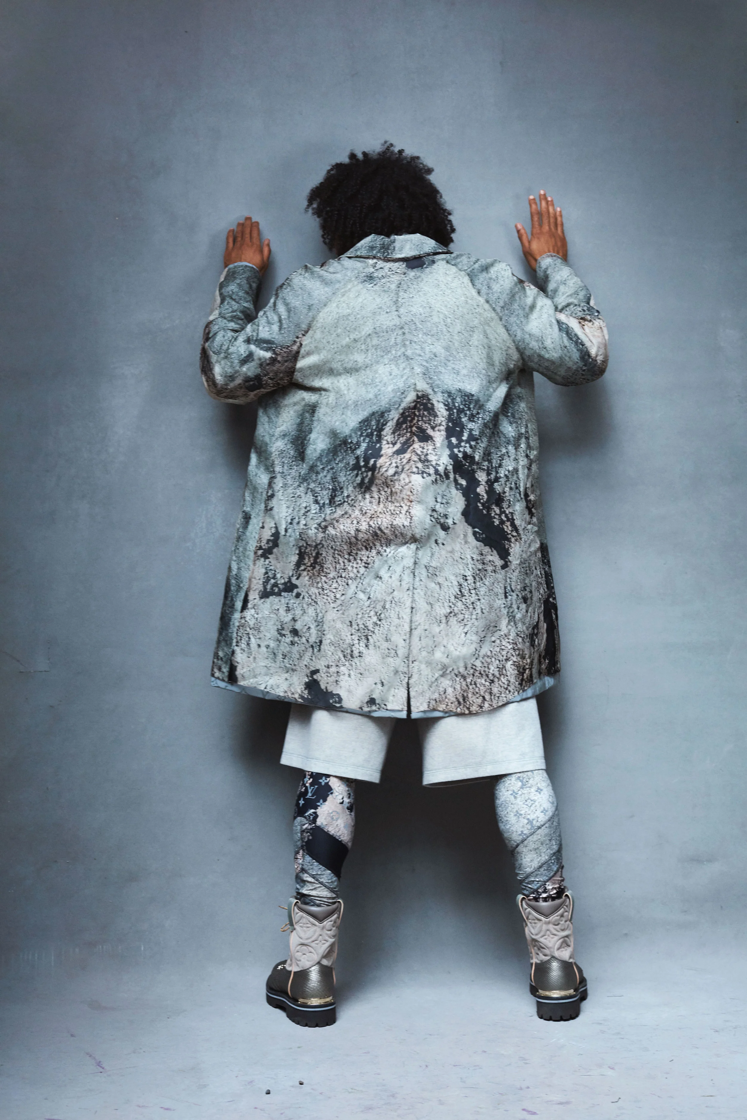 LOUIS VUITTON coat, top, t-shirt, shorts, leggings and shoes.