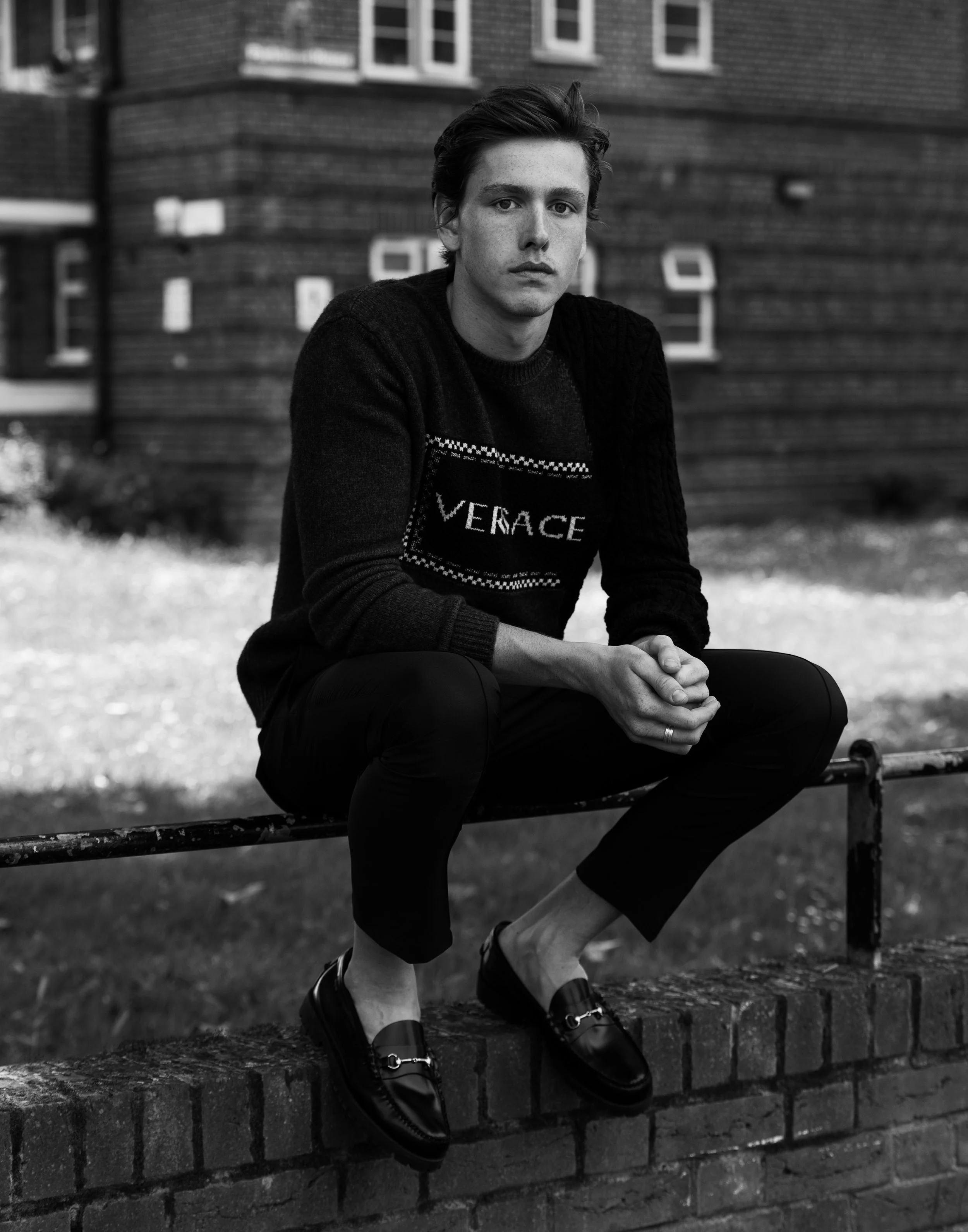 VERSACE sweatshirt and VALENTINO pants, both available at matchesfashion.com, GH BASS shoes.
