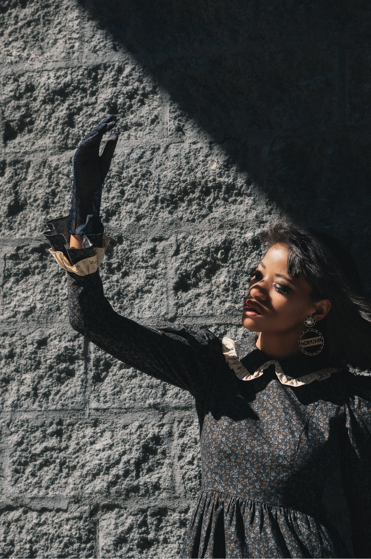 BATSHEVA dress, CHANEL earrings, and stylist's own gloves.