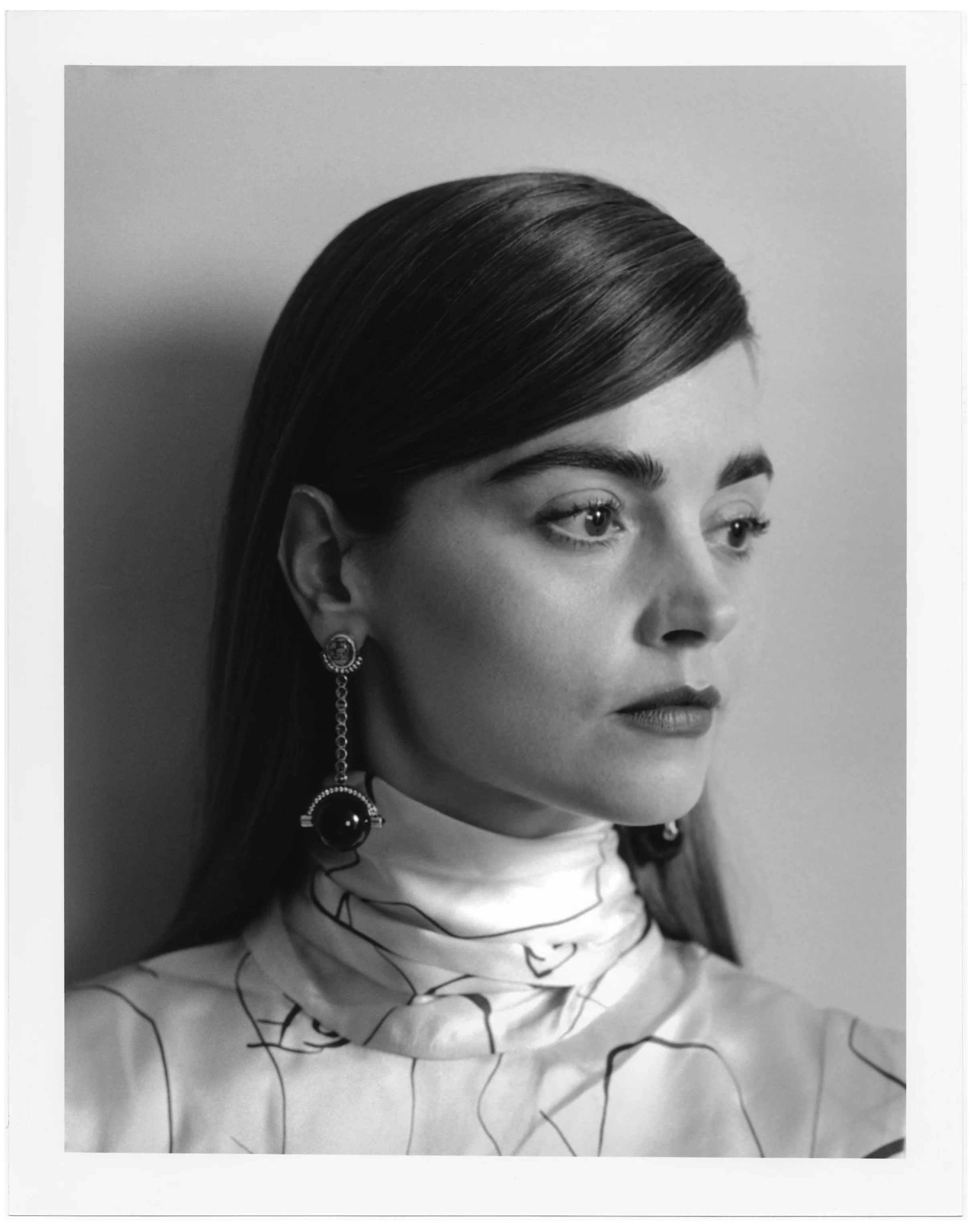    ROKSANDA     shirt available at  Matchesfashion.com  and   ARA VARTANIAN   earrings. 