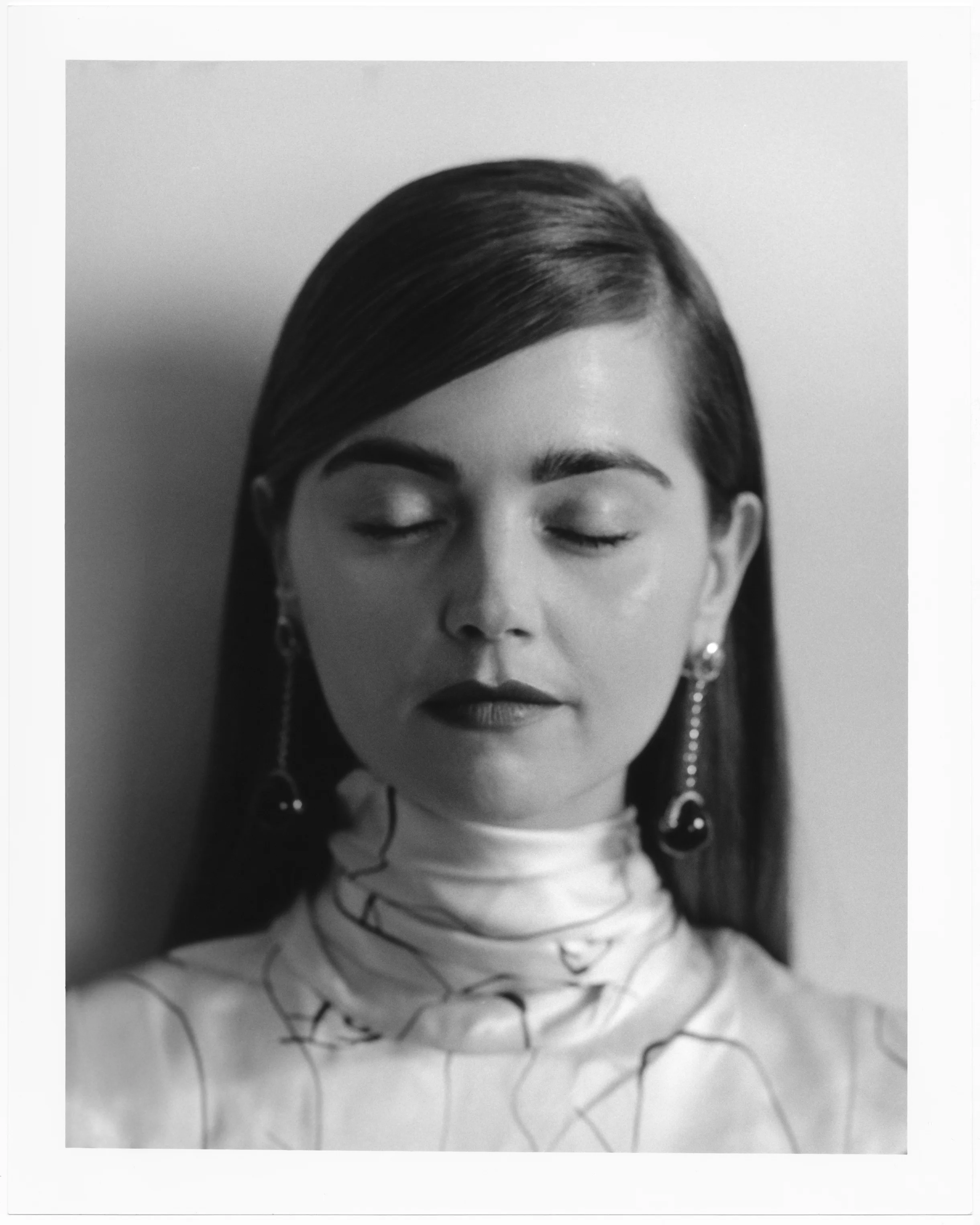    ROKSANDA     shirt available at  Matchesfashion.com  and   ARA VARTANIAN   earrings. 