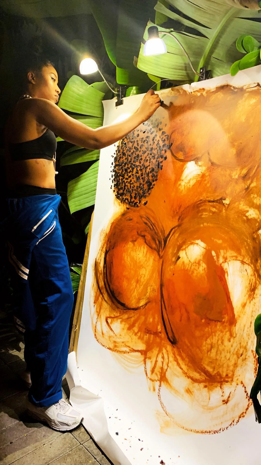 Focused! Doing a live painting in the middle of Art Basel – pressure but no pressure. I’m an artist by day and a DJ by night!
