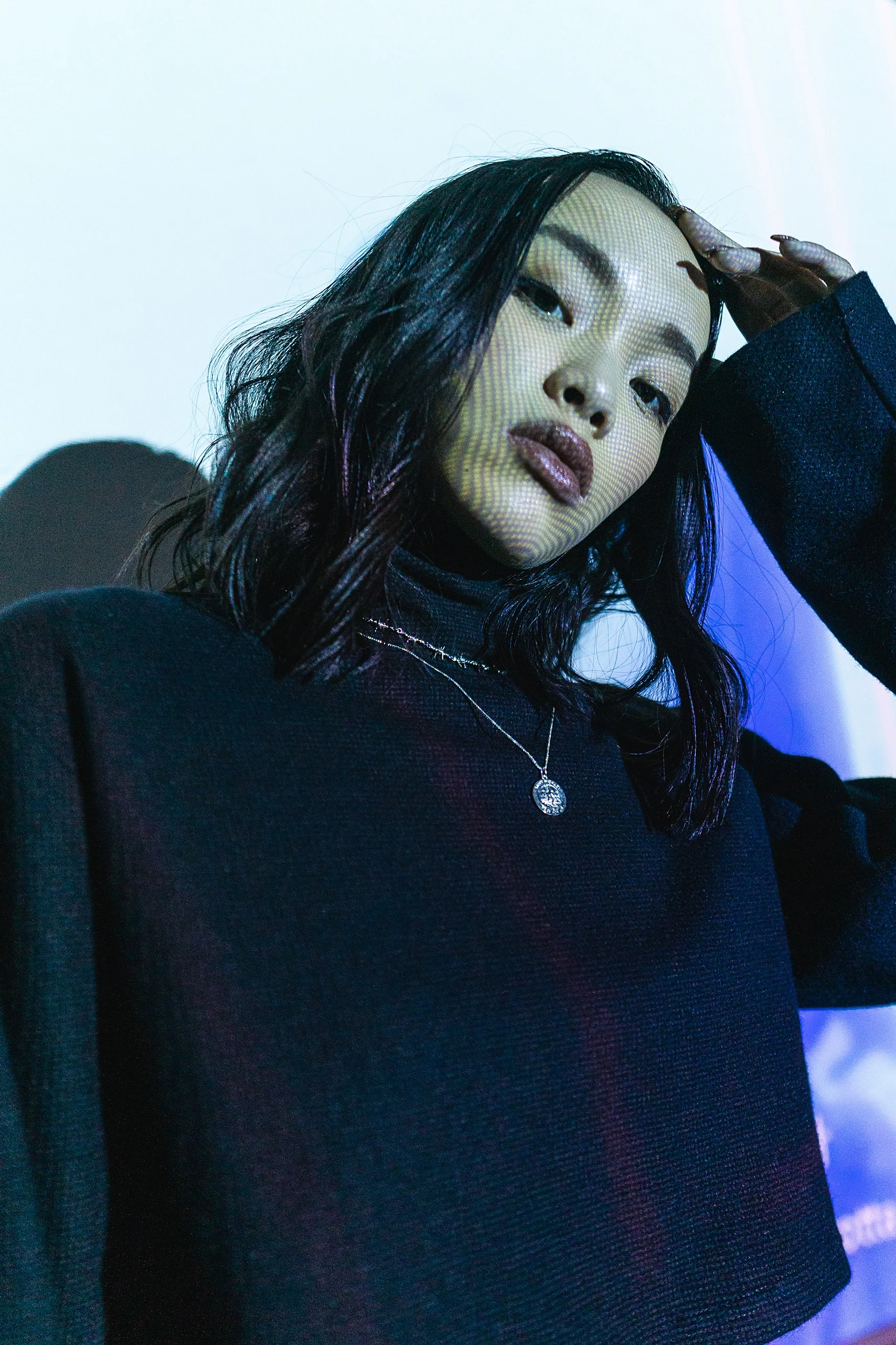 DANIELLE GUIZIO sweatsuit, and THE M JEWELERS necklaces. LEXIE LIU projection.