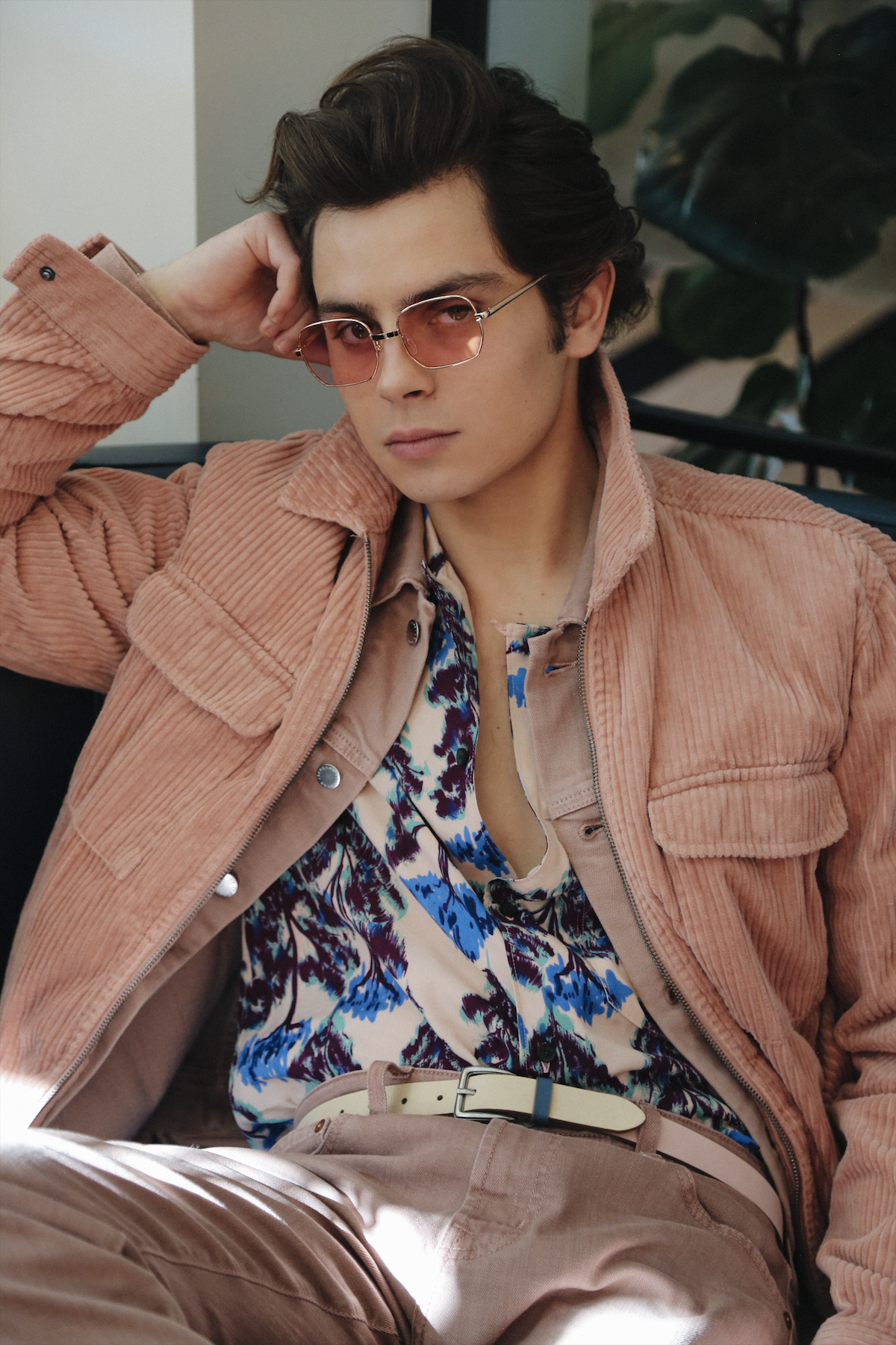 AG JEANS jacket and pants, URBAN OUTFITTERS jacket and belt, ACNE STUDIOS top, and stylist’s own glasses.