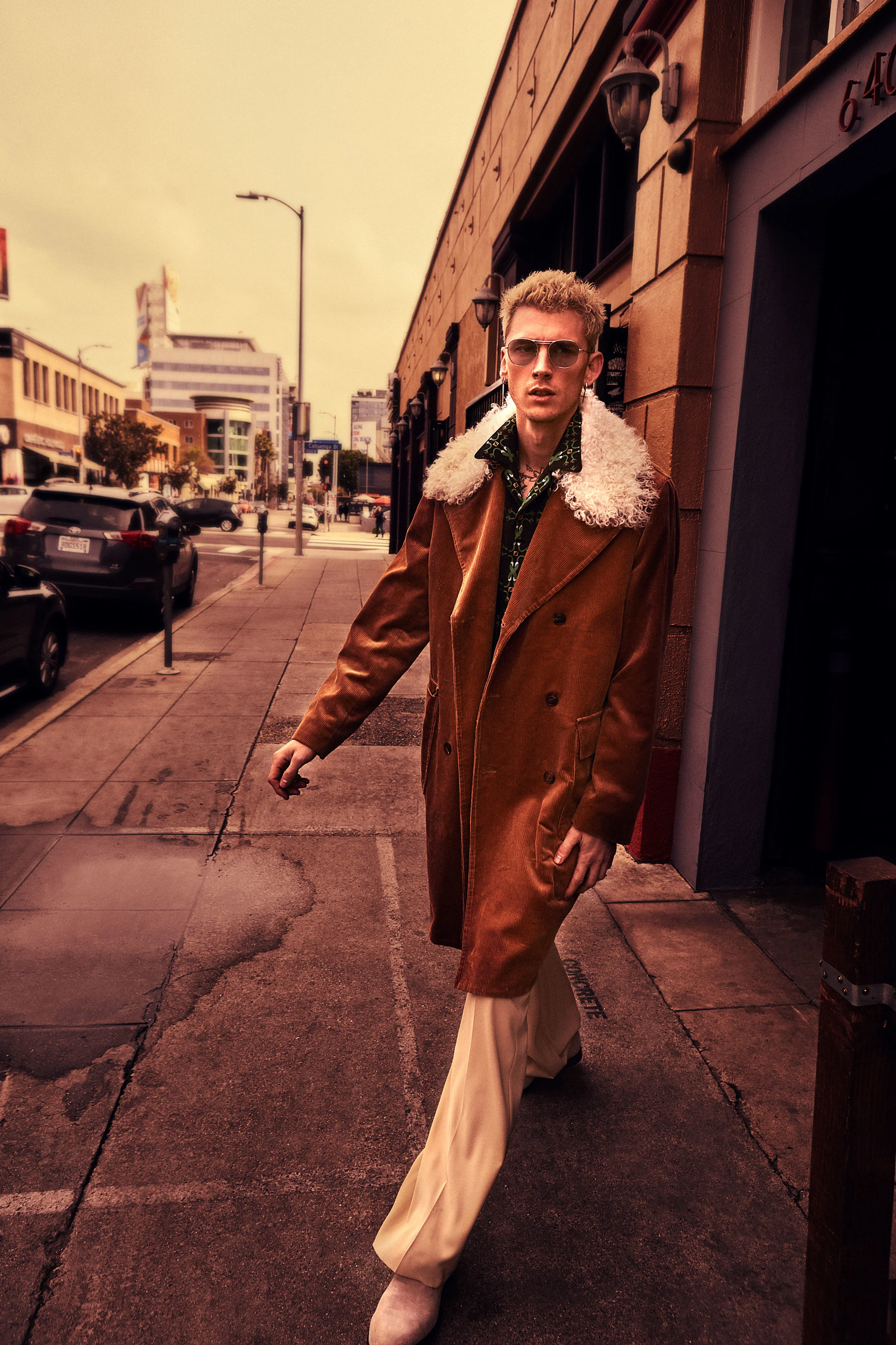 TODD SNYDER coat, FENDI shirt, SALVATORE FERRAGAMO pants, BRUNO MAGLI shoes, and OLIVER PEOPLES sunglasses