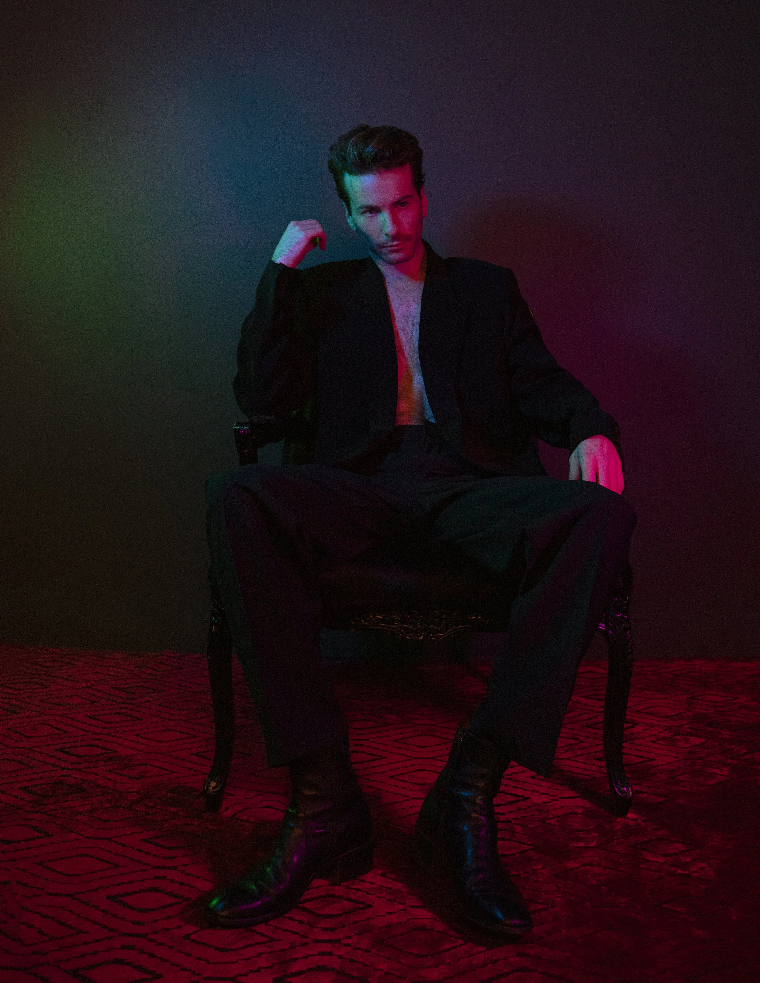 BALENCIAGA jacket and pants and talent’s own shoes