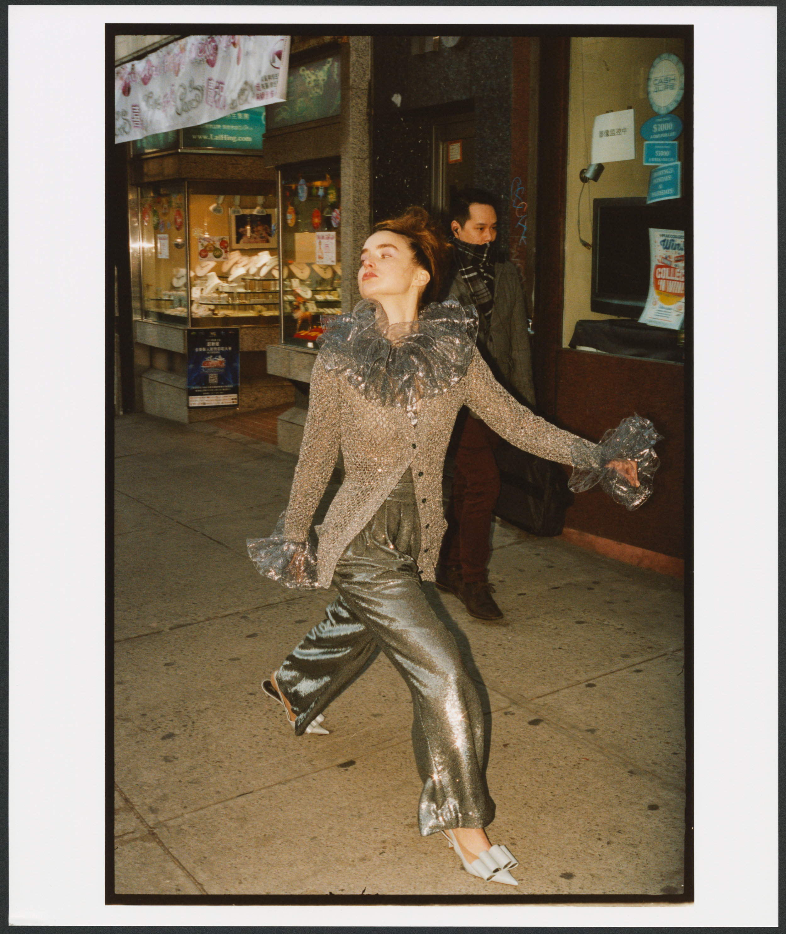 MARC JACOBS sweater, blouse, pants, and shoes.