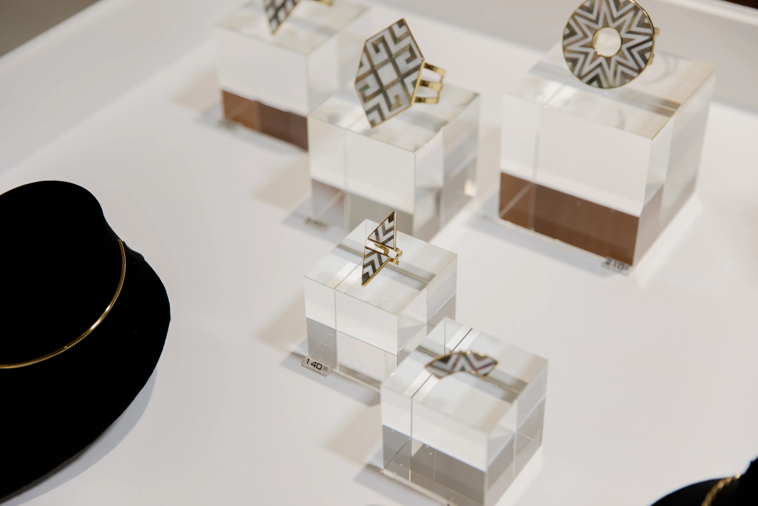 Susanne Verallo jewelry showcases minimal and deco design that is created out of repurposed shell offcuts and overruns salvaged from shell-craft companies where the items are sourced.