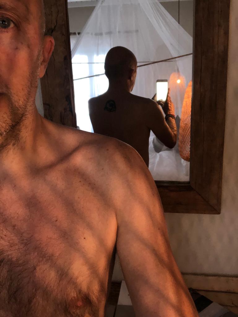 Topless in Seattle. Errr, Mykonos I mean. This shot should land me a modeling contract with other cool mags like yours.