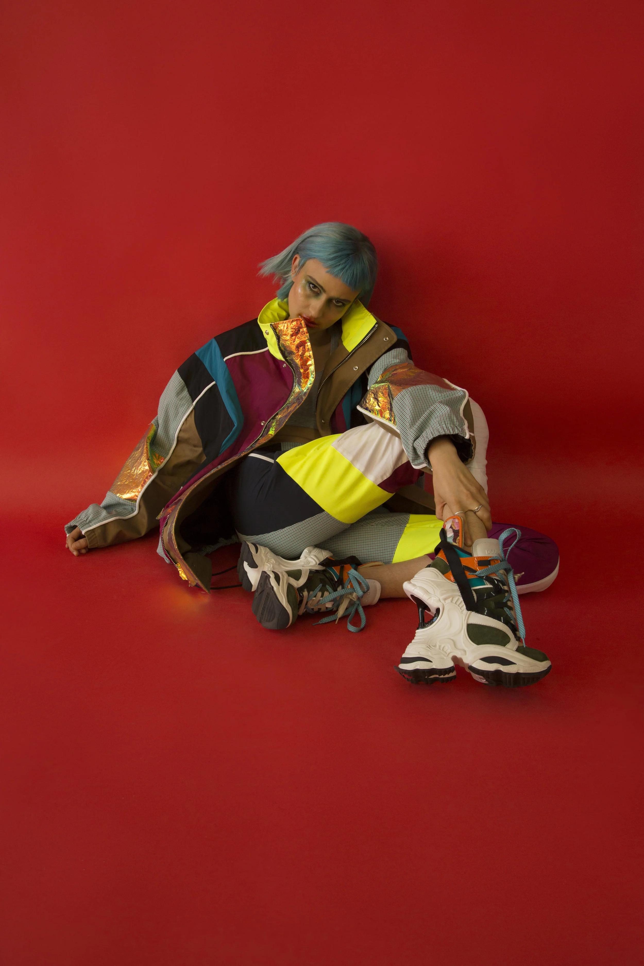 DSQUARED2 jacket, pants, and shoes.