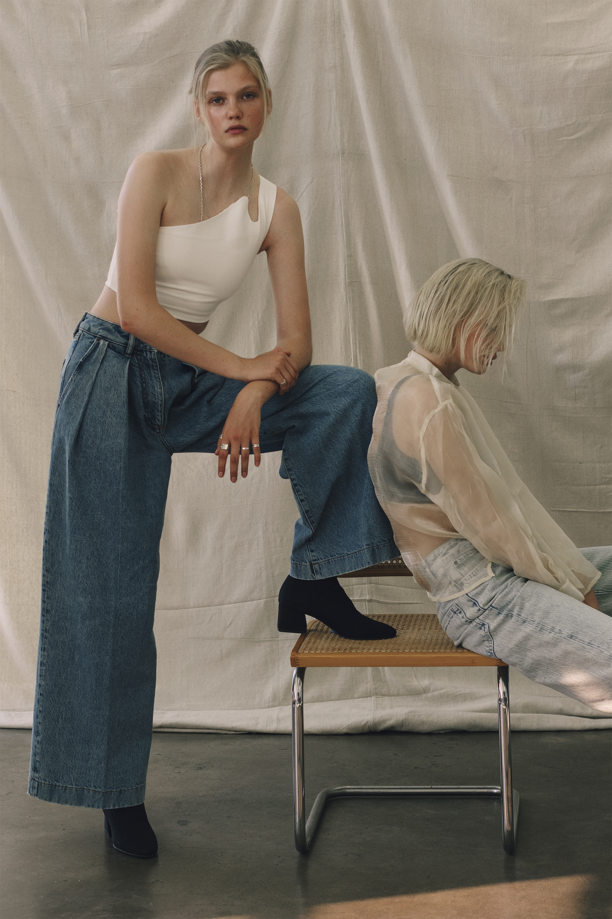 WINTER MUSE top, ACNE STUDIOS pants, and VAGABOND shoes. LIONESS top and Y/PROJECT pants