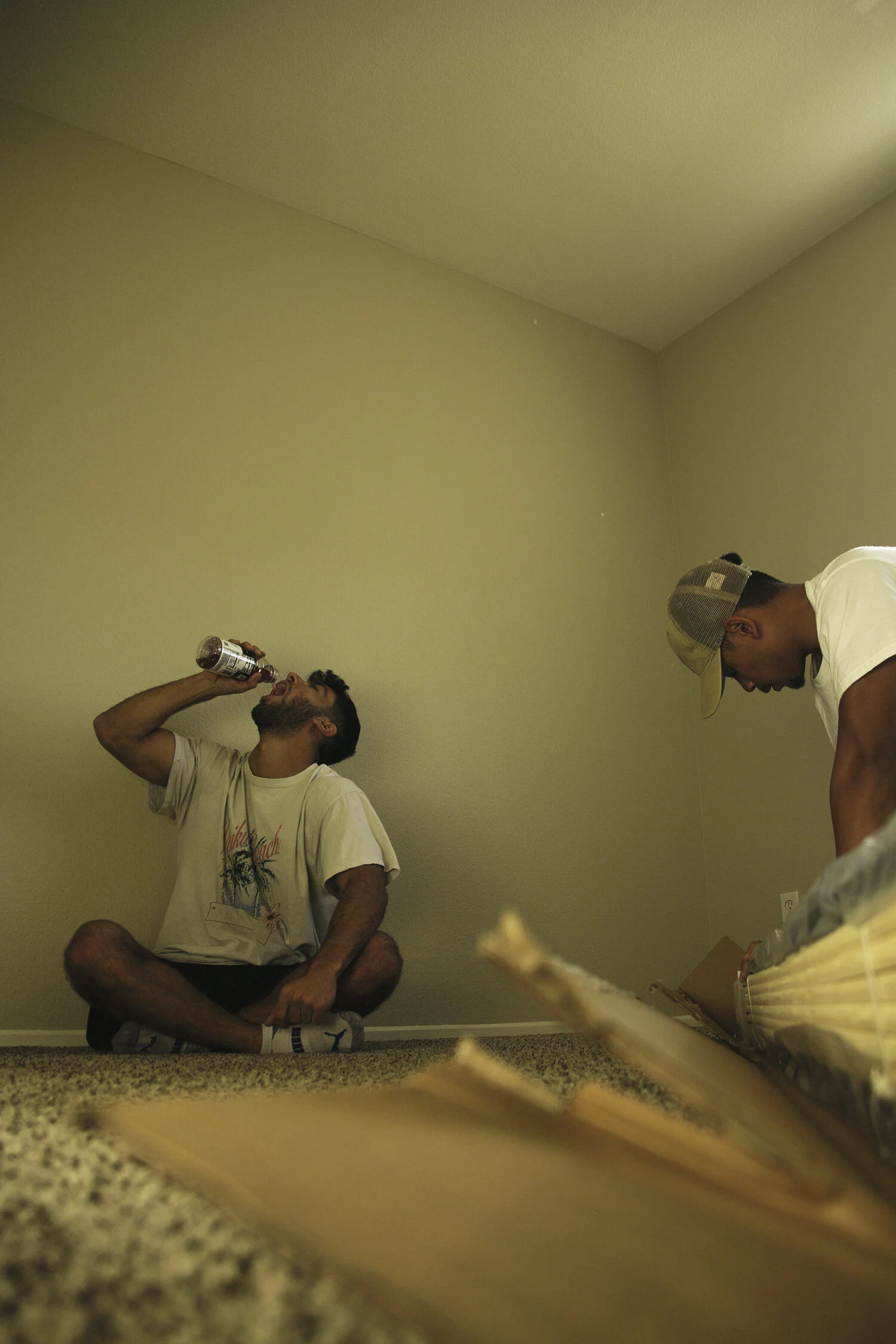 Joseph was the last to move. This is him struggling to building his bed. Tarrek walked in the room to provide "moral support."