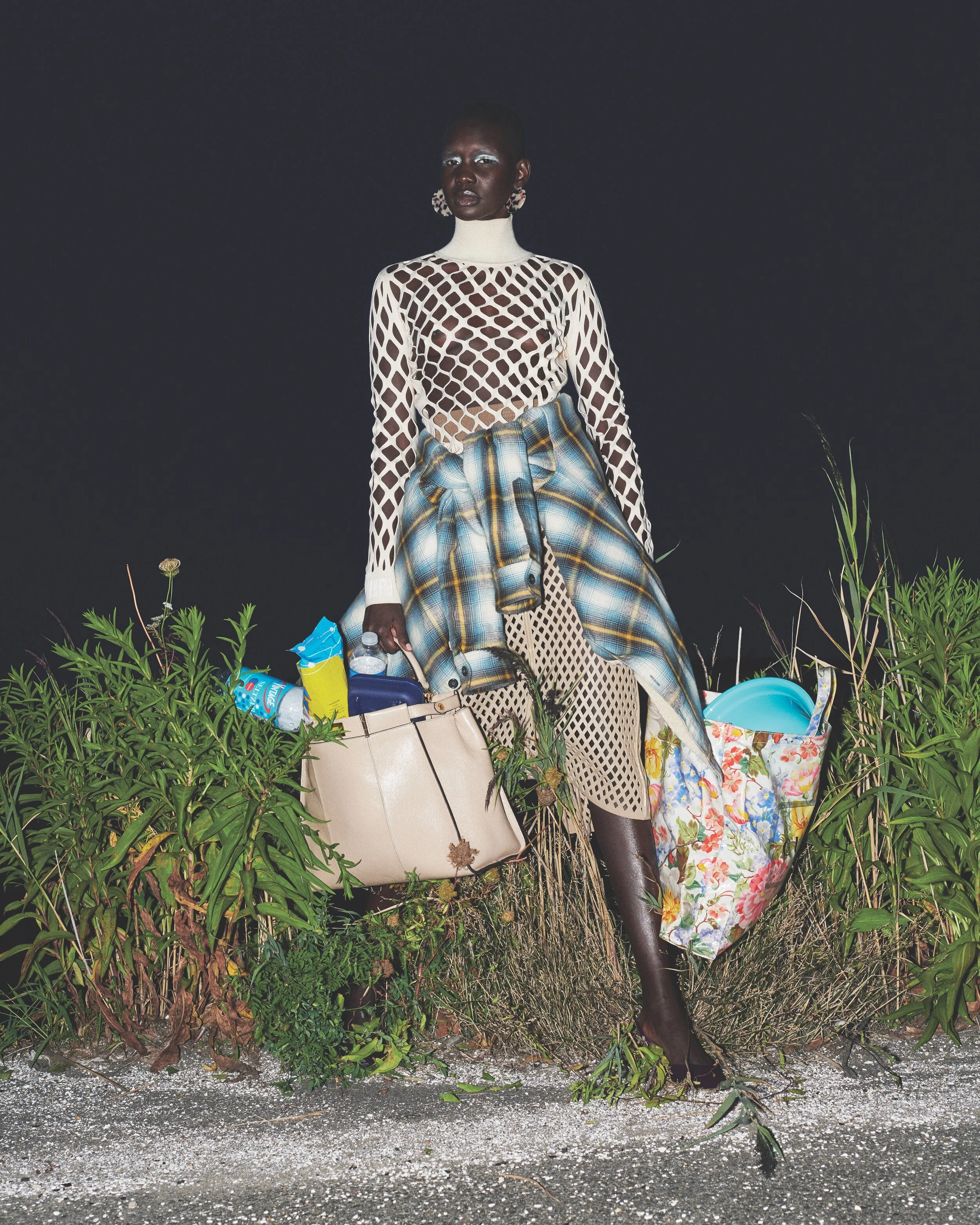 FENDI mesh top, skirt, and leather tote, DSQAURED2 plaid flannel, ALEXANDER WANG shoes, GUCCI floral tote, and MACHETE earrings.
