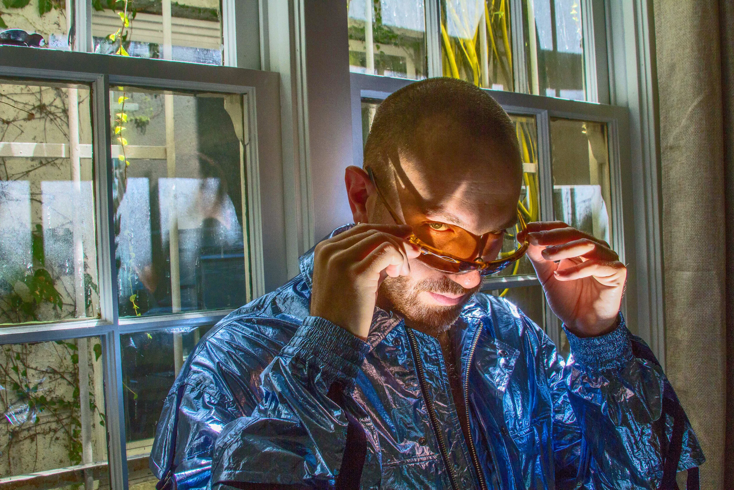 YOSHIO KUBO jacket and stylist’s own glasses.