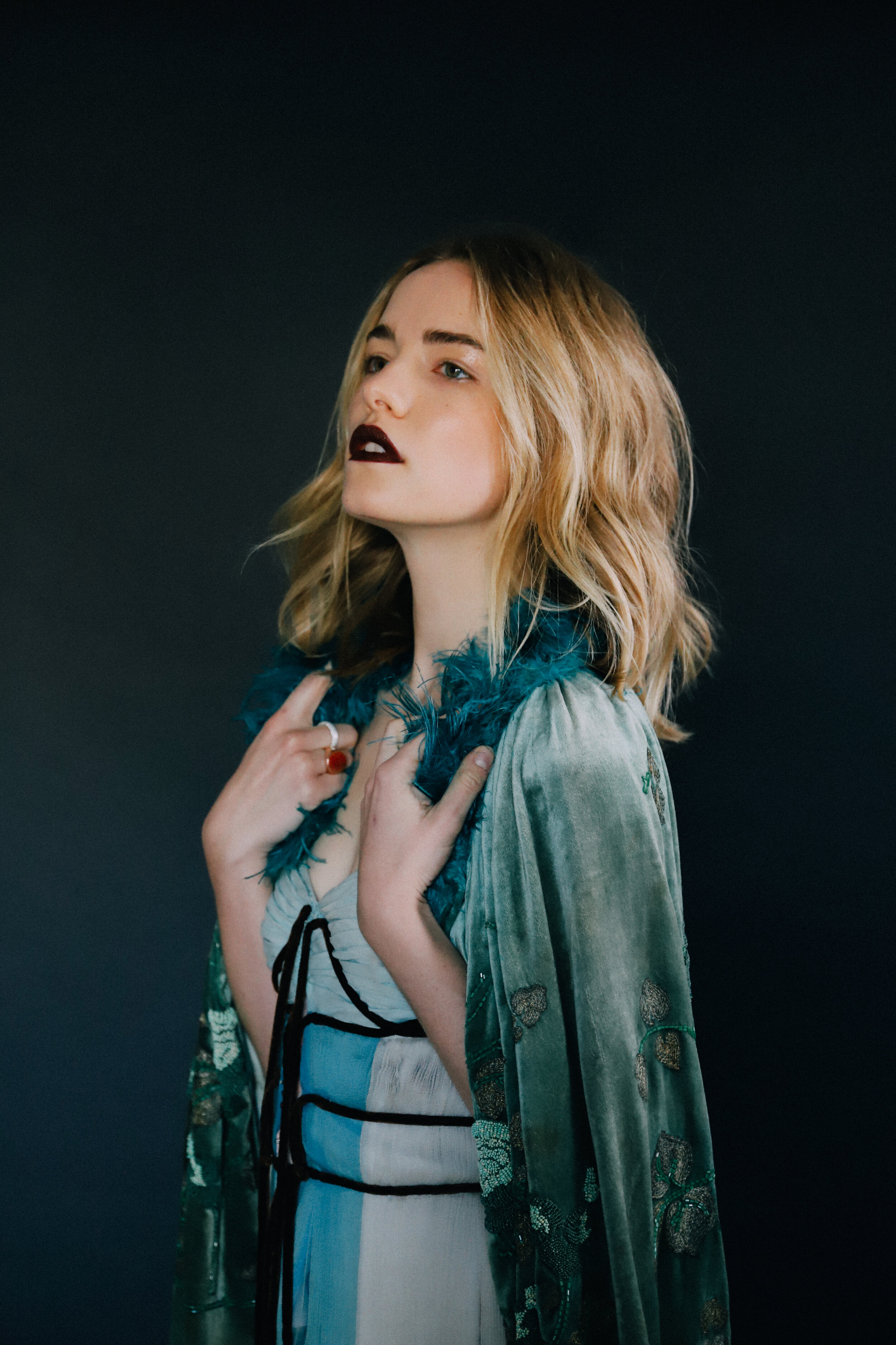 Willa Fitzgerald wears vintage cape and dress from NY Vintage and URSA MAJO...
