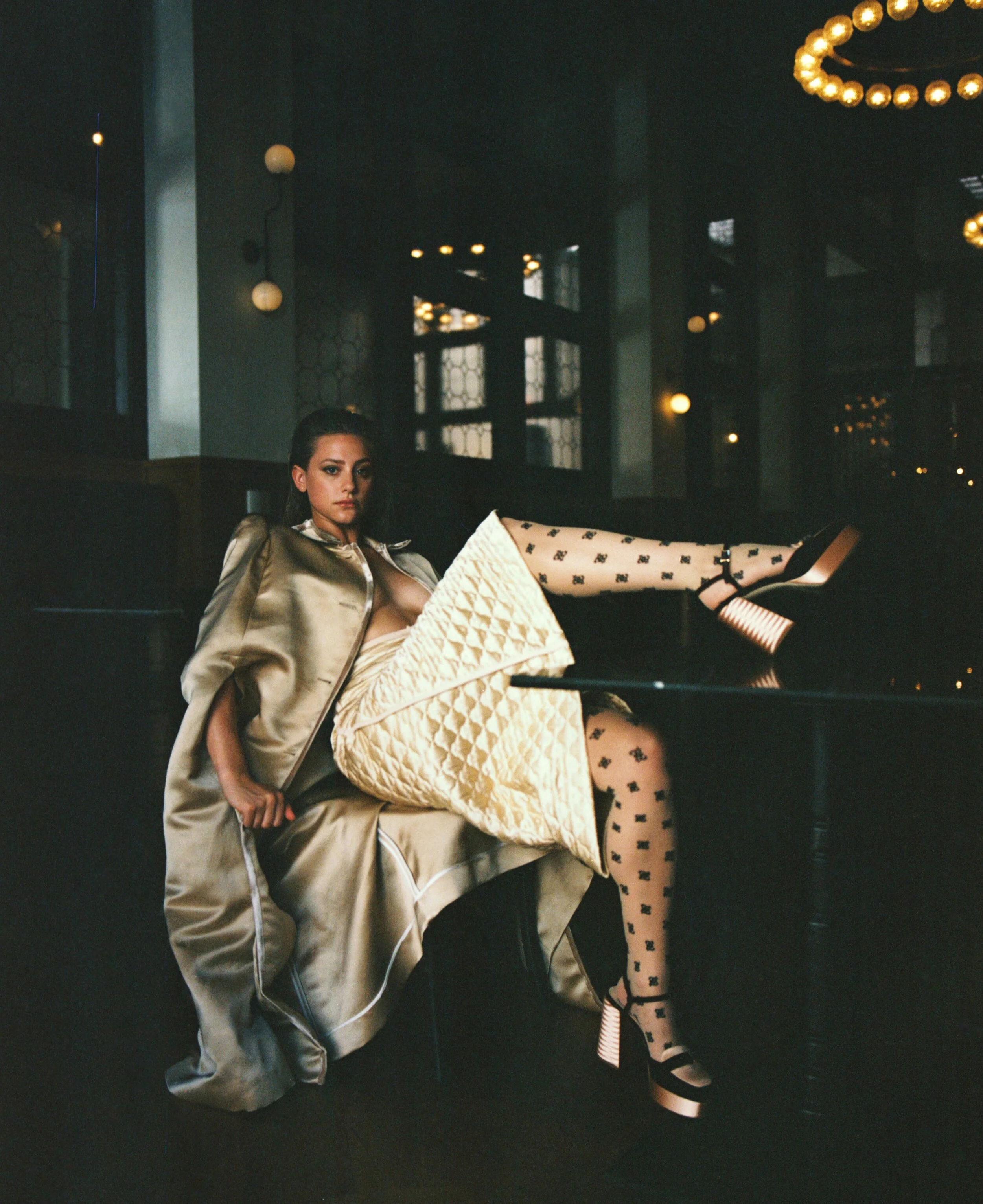 All clothing and accessories by  FENDI .