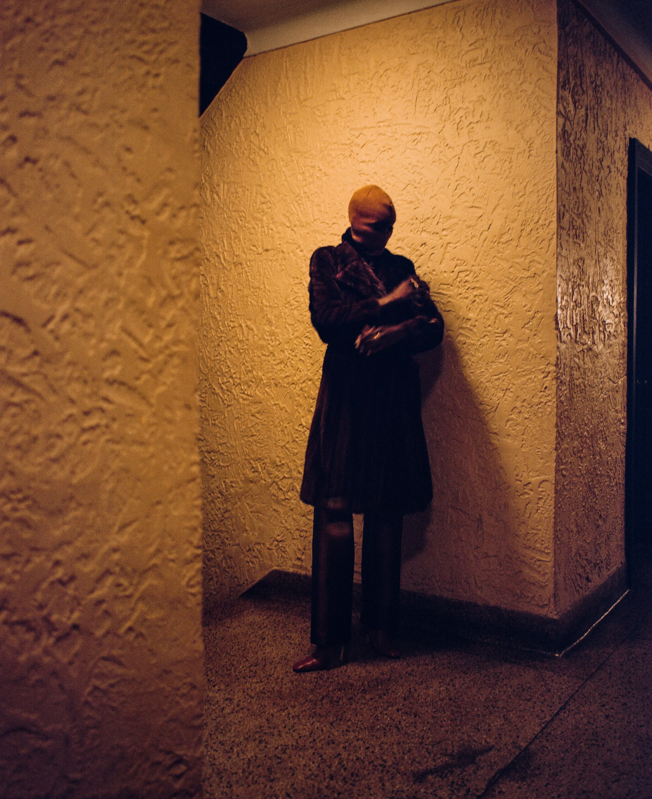 ALIÉTTE coat and pants, BROTHER VELLIES shoes, THIRD CROWN ring, and DSQUARED2 rings, and stylist’s own mask.