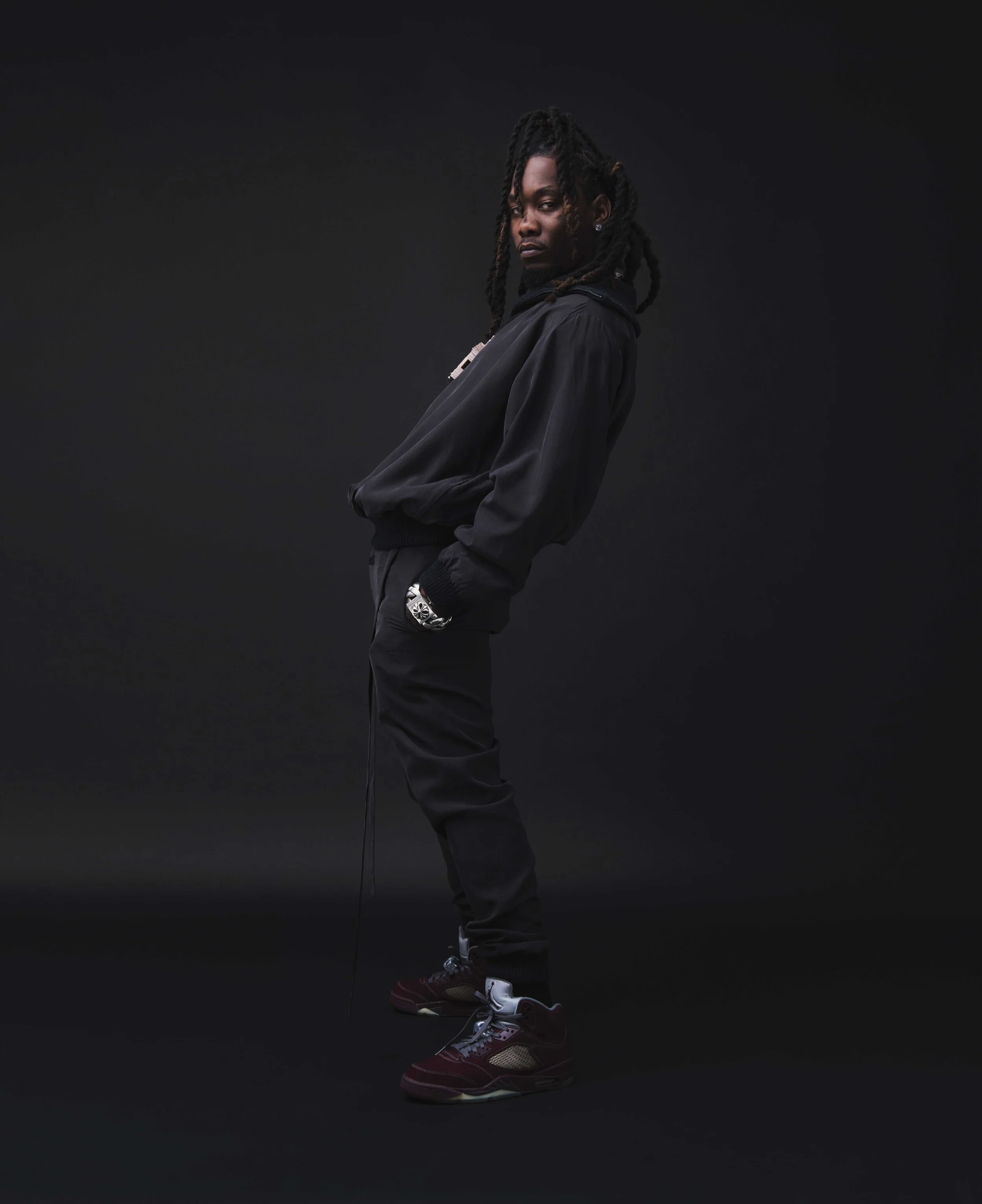  Offset wears  FEAR OF GOD EXCLUSIVELY FOR ERMENEGILDO ZEGNA  and talent’s own Chrome Hearts jewelry. 