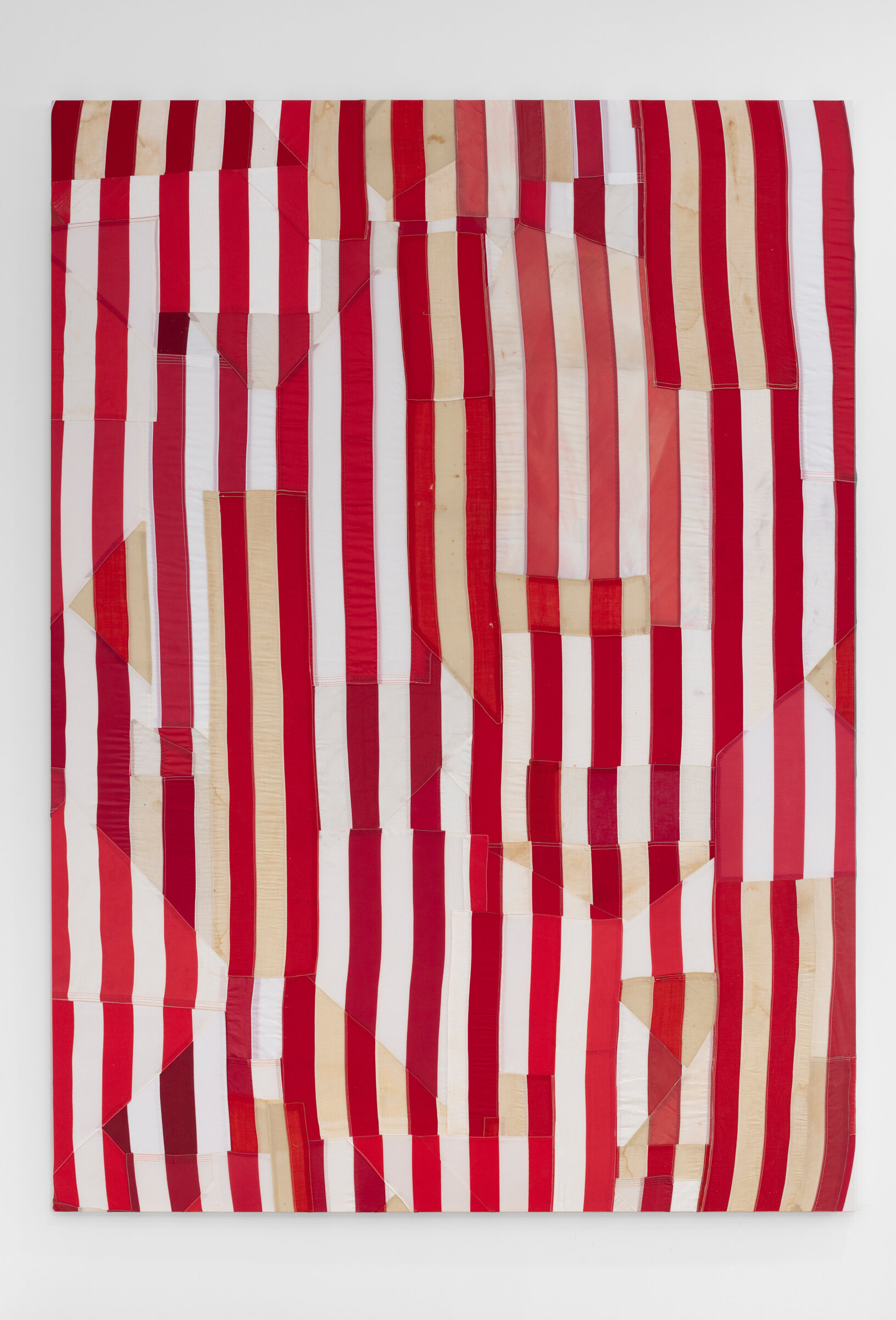 Hank Willis Thomas. “14 Red Bars” (2020). Mixed media quilt including American flags. 97” x 69.5”. Courtesy Hank Willis Thomas and Jack Shainman Gallery.