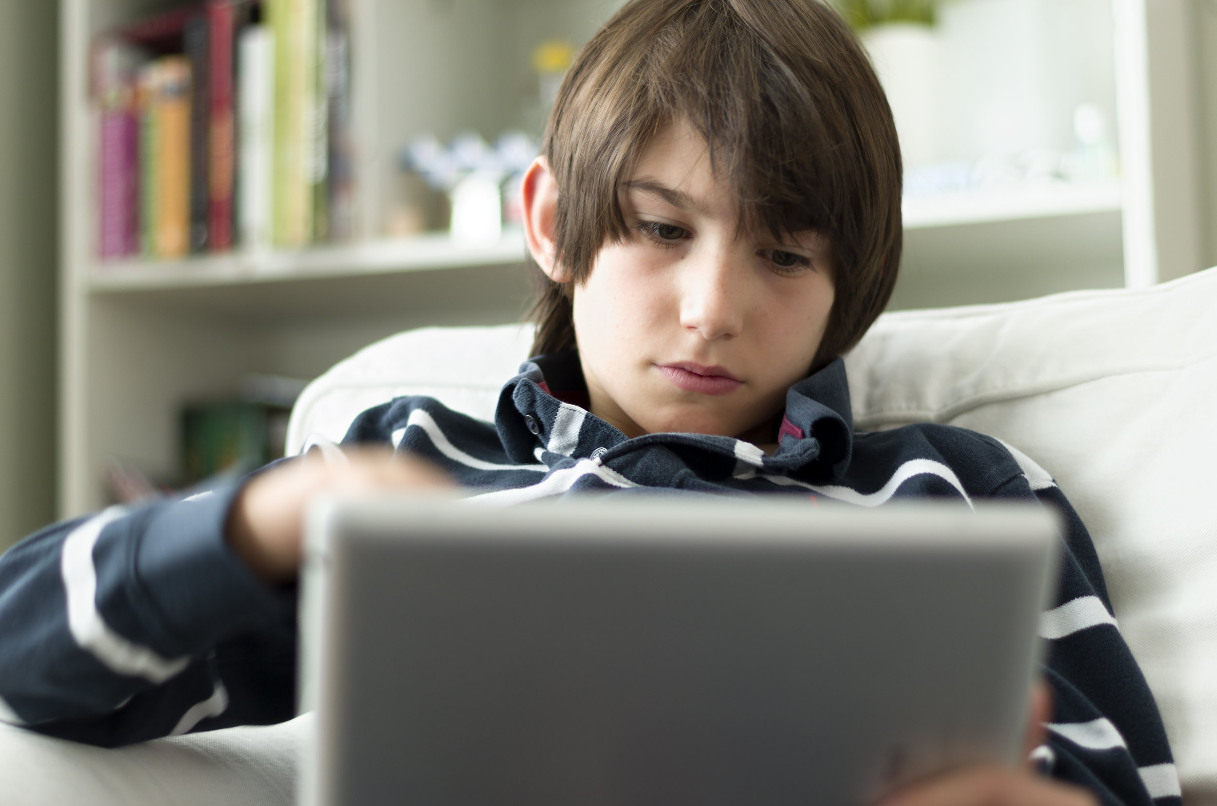 boy with electronic.jpeg