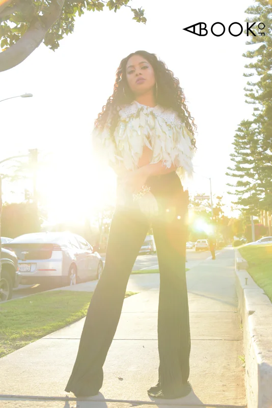 Feather Jacket: ELISABETTA FRANCHI Pants: H&M COLLECTION Earrings: 8 OTHER REASONS Shoes: ALIAS MAE