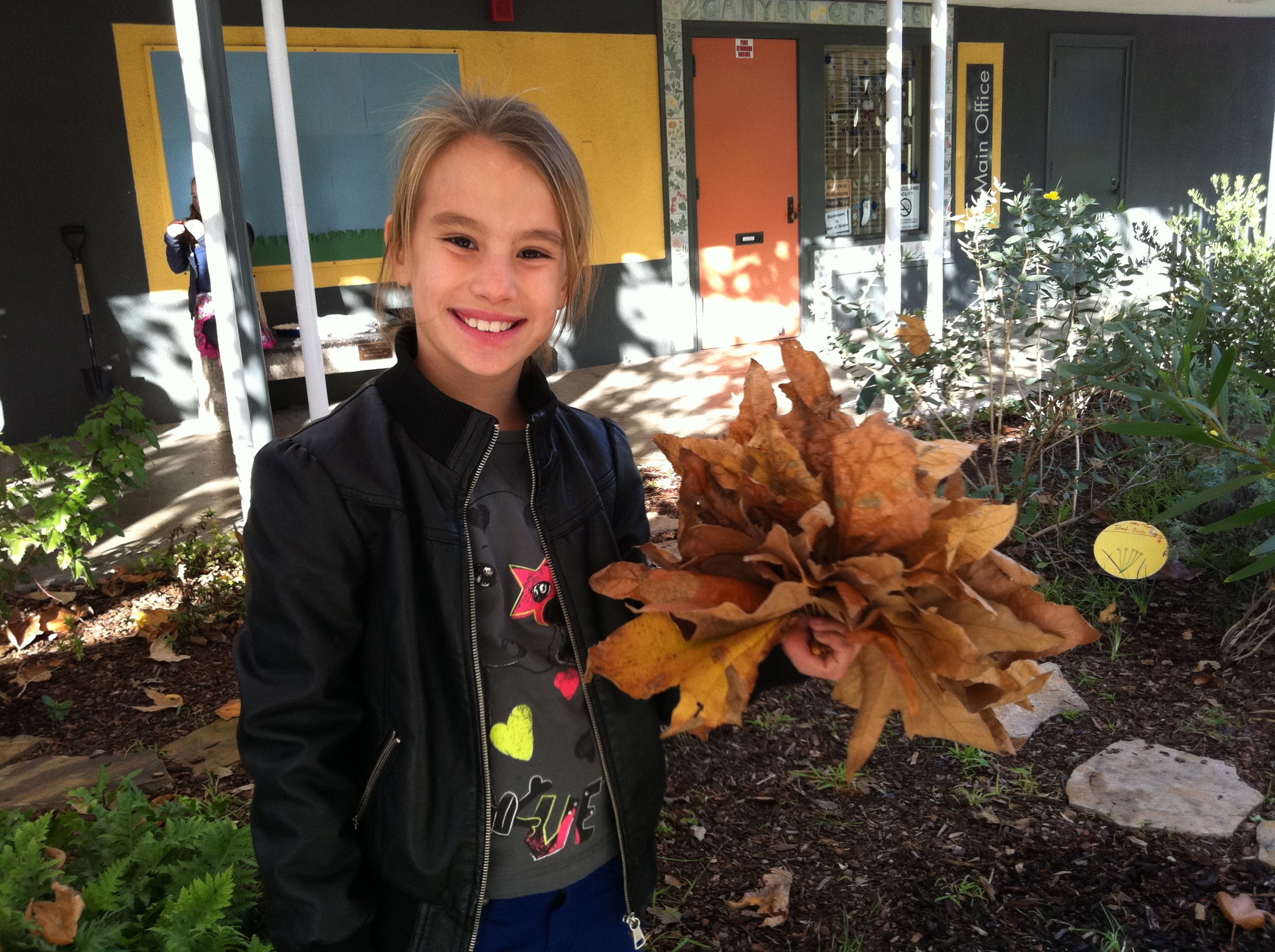 amanda with leaf bouquet.jpg