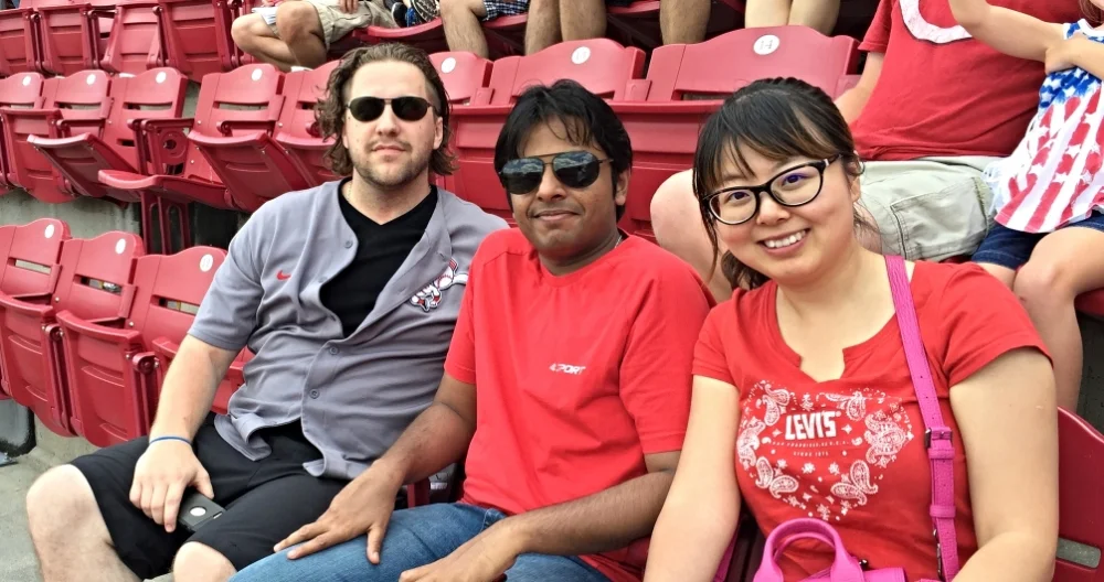 Brett, Mario, and Qinyuan enjoying the game.