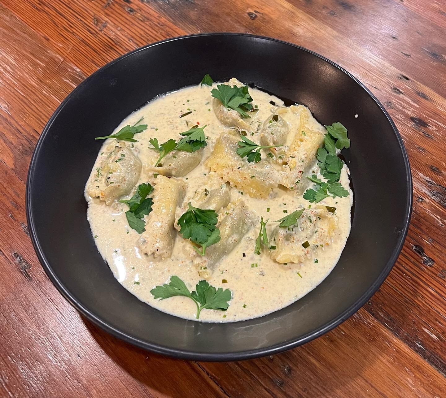 Your Friday night just got a lil tastier with this #featurefriday .

Hogs head agnolotti, creole mustard cream sauce, herbs, pepper jelly.