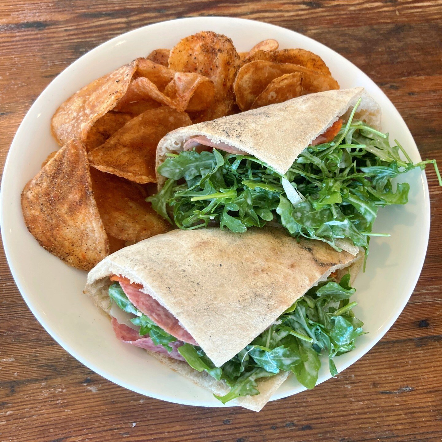 Italian deli piadina. ⁠
⁠
Salami, pepperoni, Chisesi ham, and mozzarella stuffed in a freshly made piadina and dressed with arugula and marinated onions. ⁠
⁠
Come enjoy one today at #sammichsaturday for only $7! ⁠
⁠
#piadina