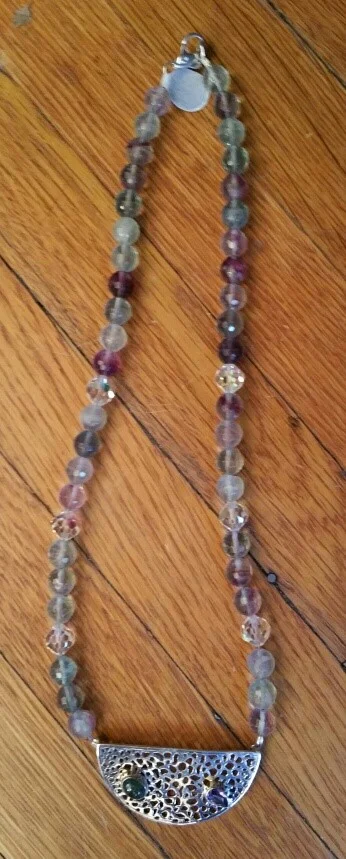 Fluorite beads with sterling pendant, enhanced with with faceted amethyst and labradorite cabochon. 18" total. Sterling lobster clasp has a dolphin look. $73