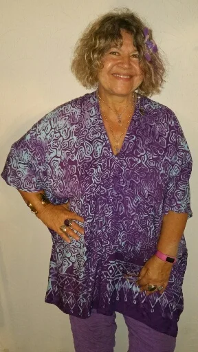 Large short caftan with pin tuck details in front and back. $37