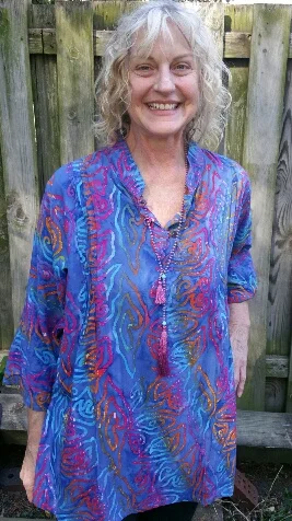 Three button rayon blouse with vertical pin tuck sewing on front. Size Large. $33