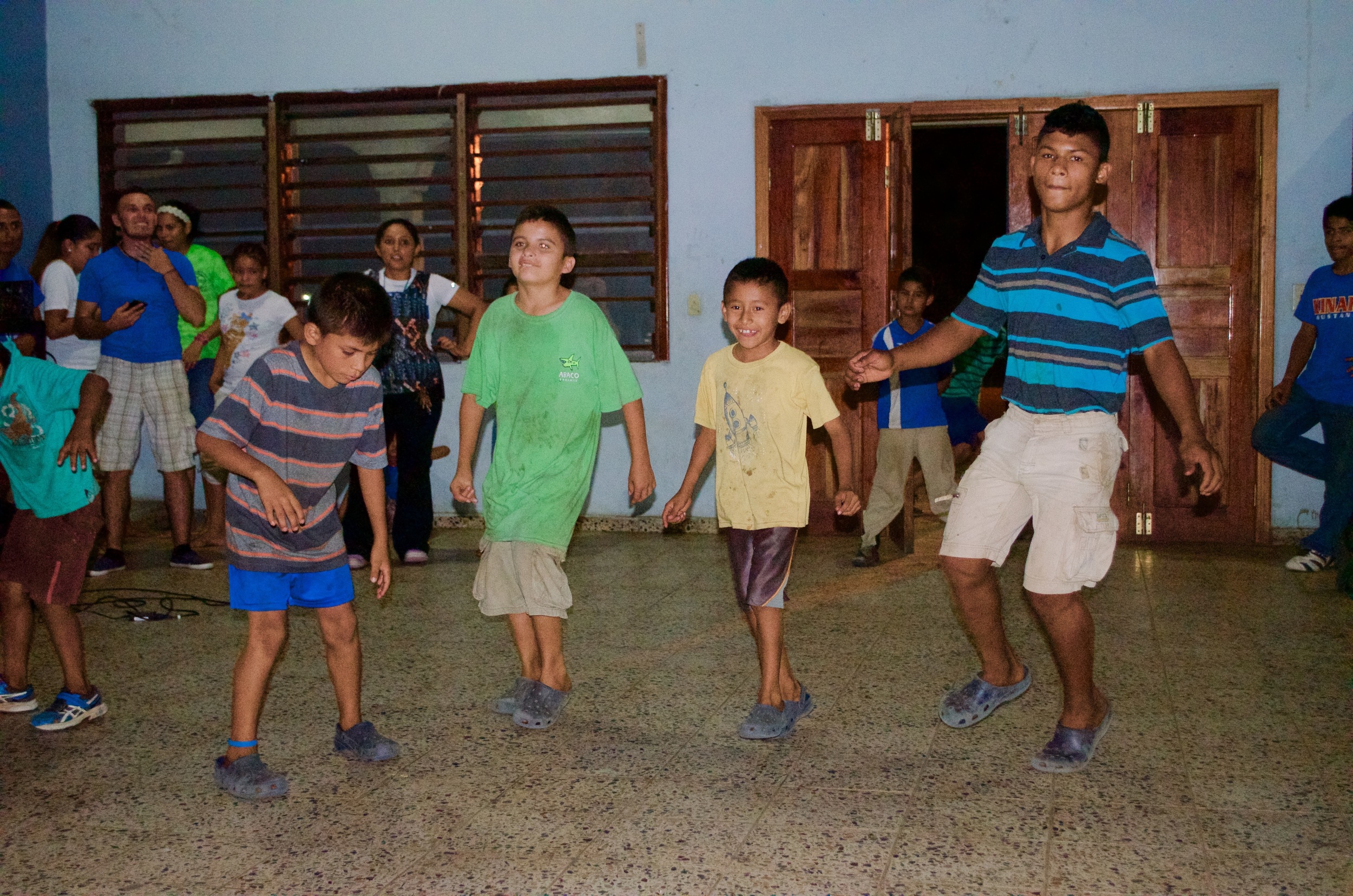 Participating in a Saturday night dance competition (Pancho is in the green shirt)