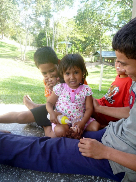 Perla getting lots of attention from her new "brothers" at Amigos shortly after arriving in 2012