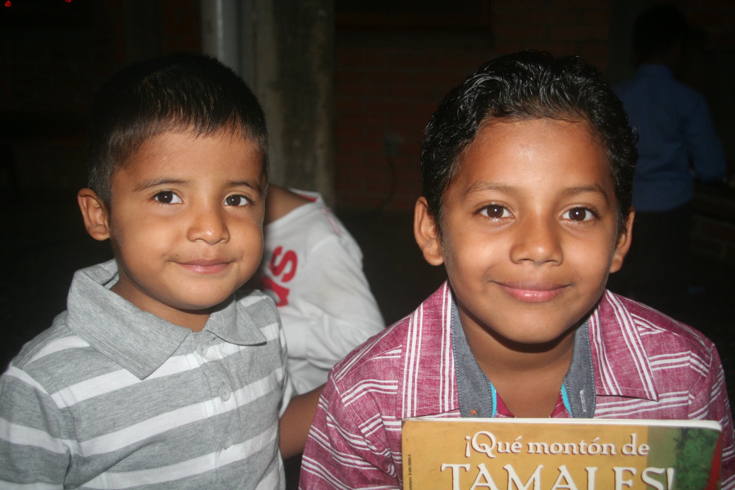 Isaac (left) and one of his older brothers