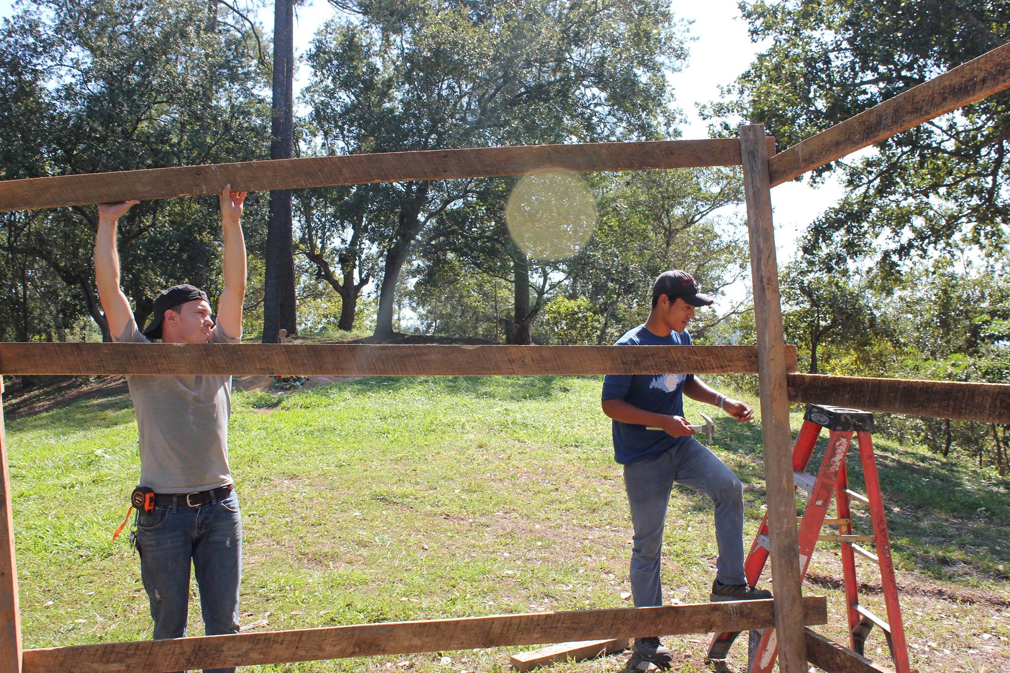 Padrino Antonio (left) working with one of our older boys.