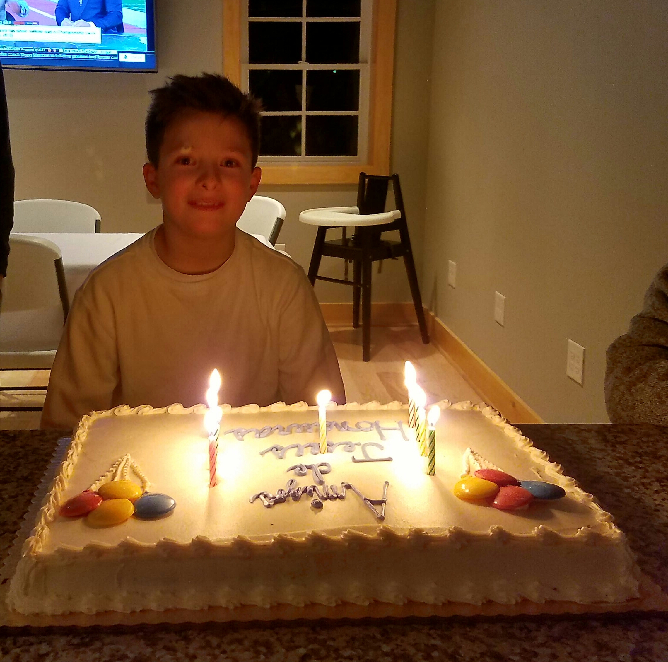 Christopher's special birthday cake that says, "Amigos de Jesús!"