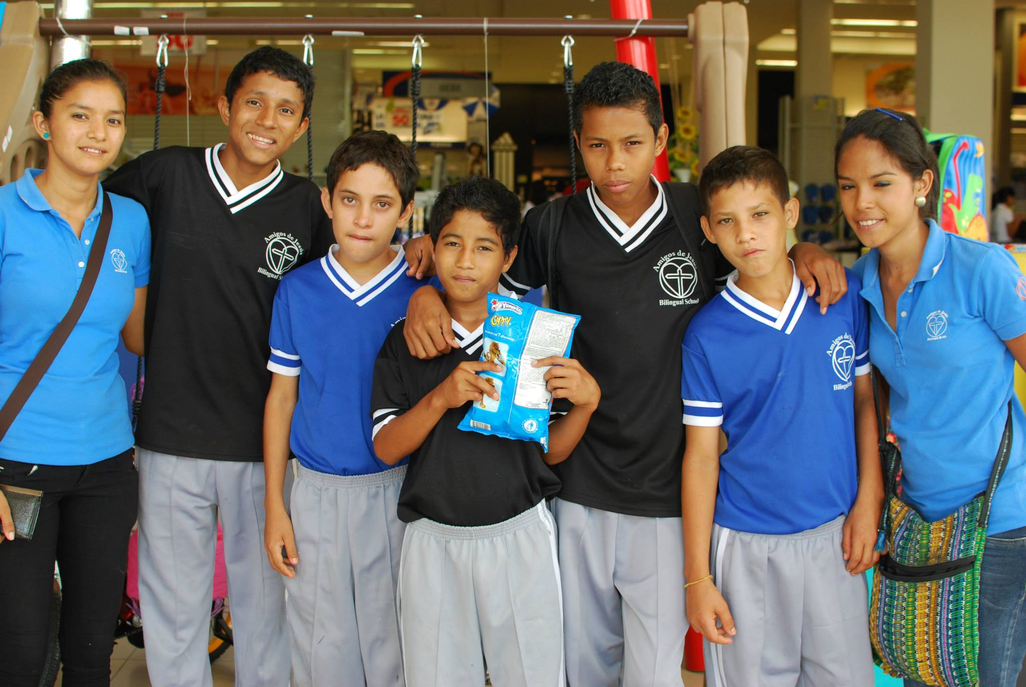 Profe Viviana (right) with some of her first students in 2013.