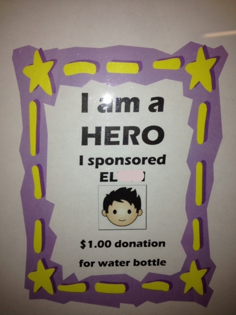 This is a water bottle sale sign that we have in our office. We sell water to raise money for the pizza that we purchase when we arrive in Honduras. After arriving in the airport, we order hundreds of slices of pizza and bring it to the hogar on our visits! The water sales are unbelievably popular and we raised several hundred dollars over the year.