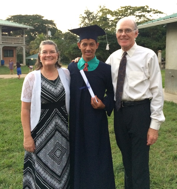 Ann, her husband and Juan* who just graudauted high school this November and is now college bound! 