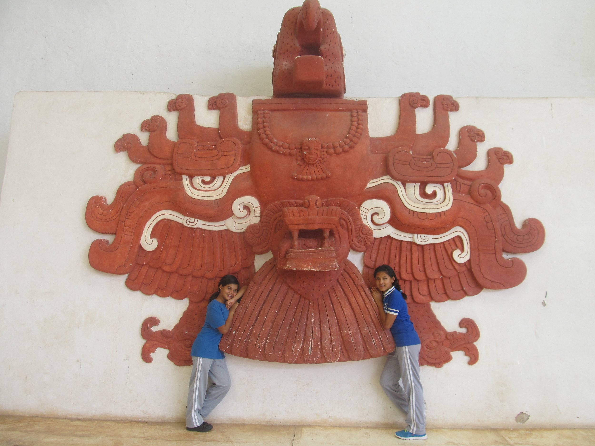 Maria (right) and a classmate visiting the Mayan ruins on a school field trip last year.