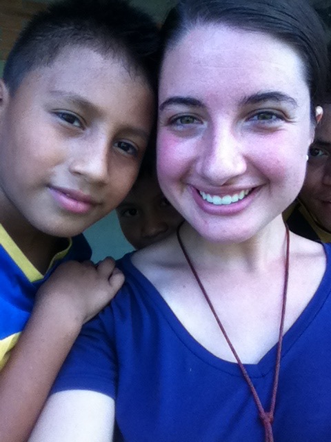 Esteban with volunteer Miss Ashley.